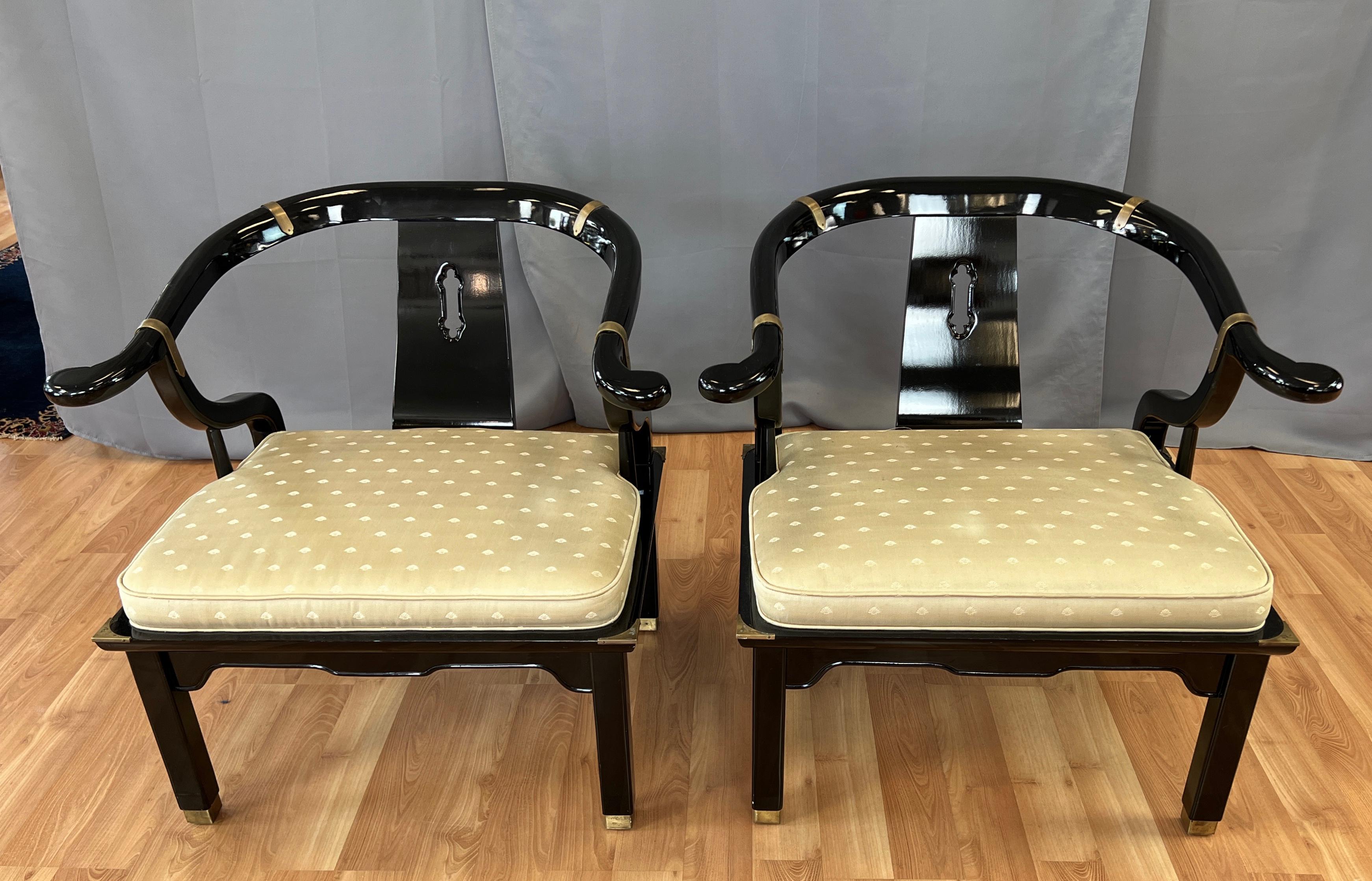 Offered here is a pair handsome Chinese style black lacquer horseshoe back chow chairs, by Century Chair Company.
Giving you a touch of Chinese Modern with a dash of James Mont. Horseshoe shaped backs, with a cut out in the middle of both with
