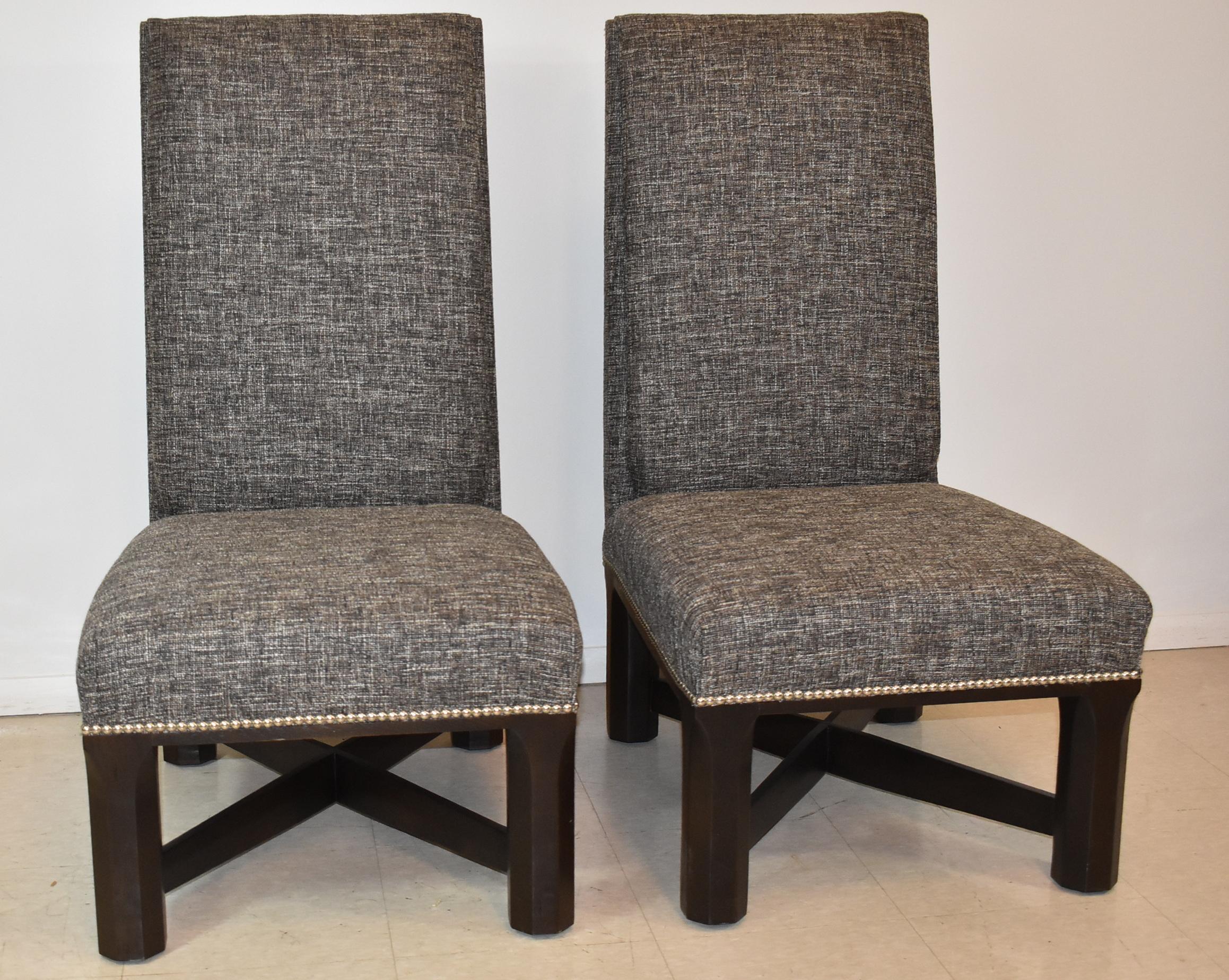 Pair of Century Furniture Parson side chairs. Tweed upholstery in shades of cream , charcoal and tan. Decorative nailhead border. Legs and stretcher bars in espresso finish. Very nice to excellent condition. Dimensions: 28