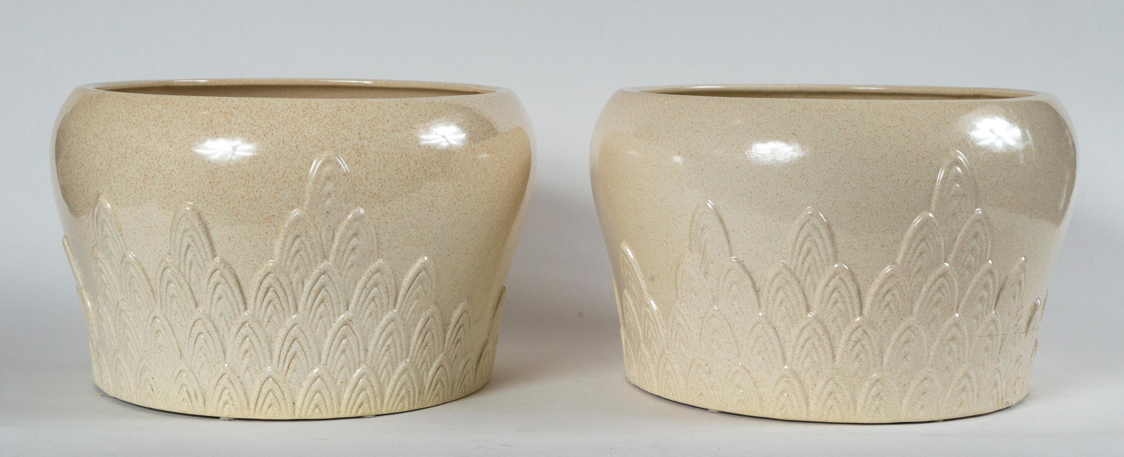 Pair of ceramic planters, Tommaso Barbi, Italy, mid-20th century. A striking pair of planters with raised, arched design and stippled glaze. Signed Tommaso Barbi, Ceramiche, Italy. A post war Italian artist, Barbi worked with a variety of materials