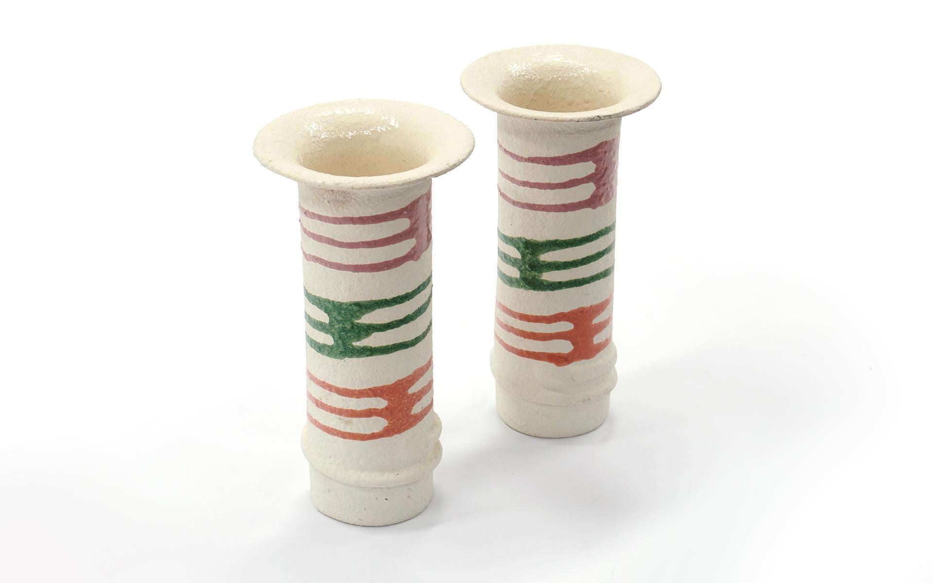 Pair of 1980s white textured ceramic pottery vases in excellent condition. Abstract designs in orange, green and red.
