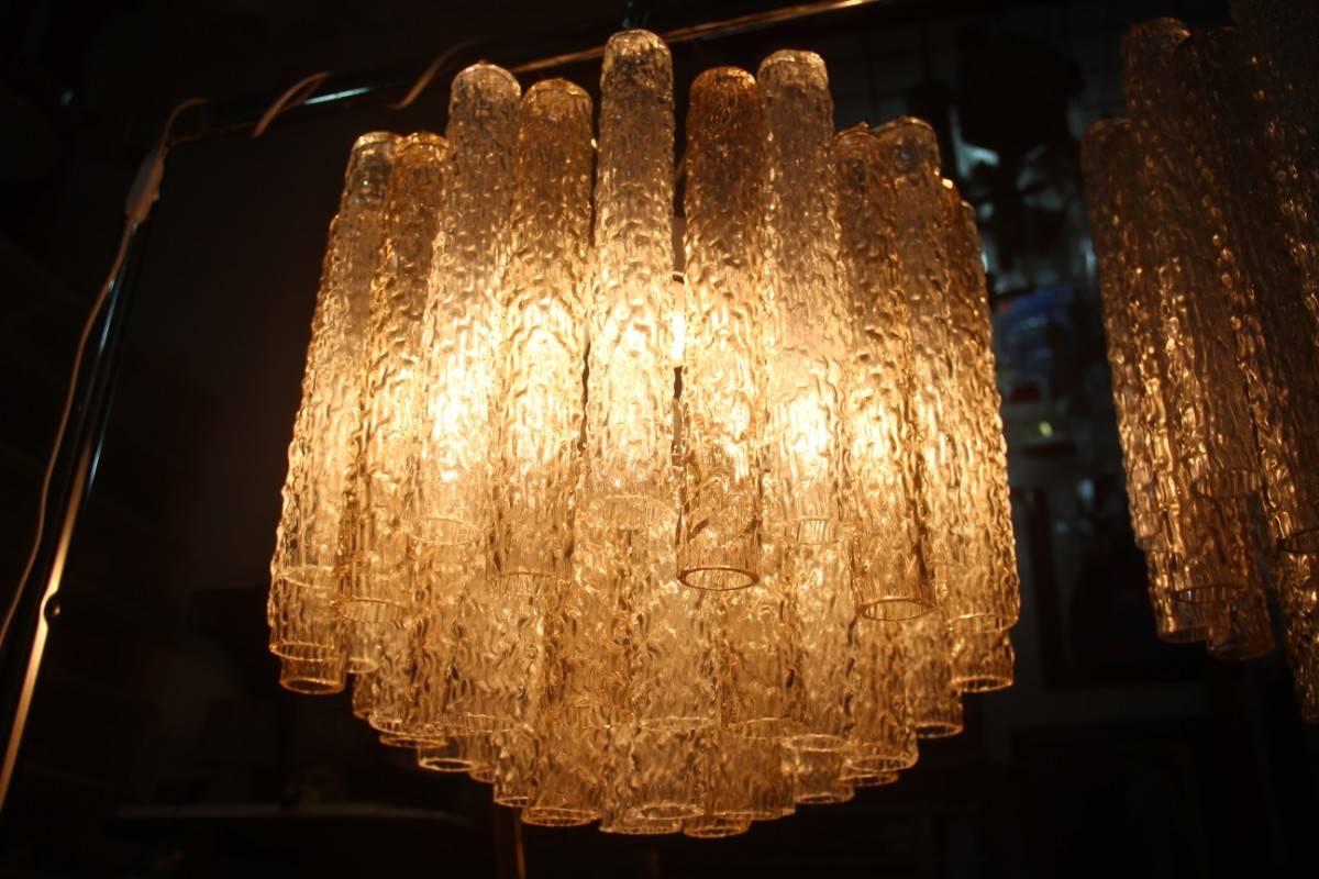 Pair of chandelier Venini design 1960s Murano art glass, glass tubular things if they were tree trunks, transparent and slightly gray, each lmpadario has eight bulbs E27 large attack.