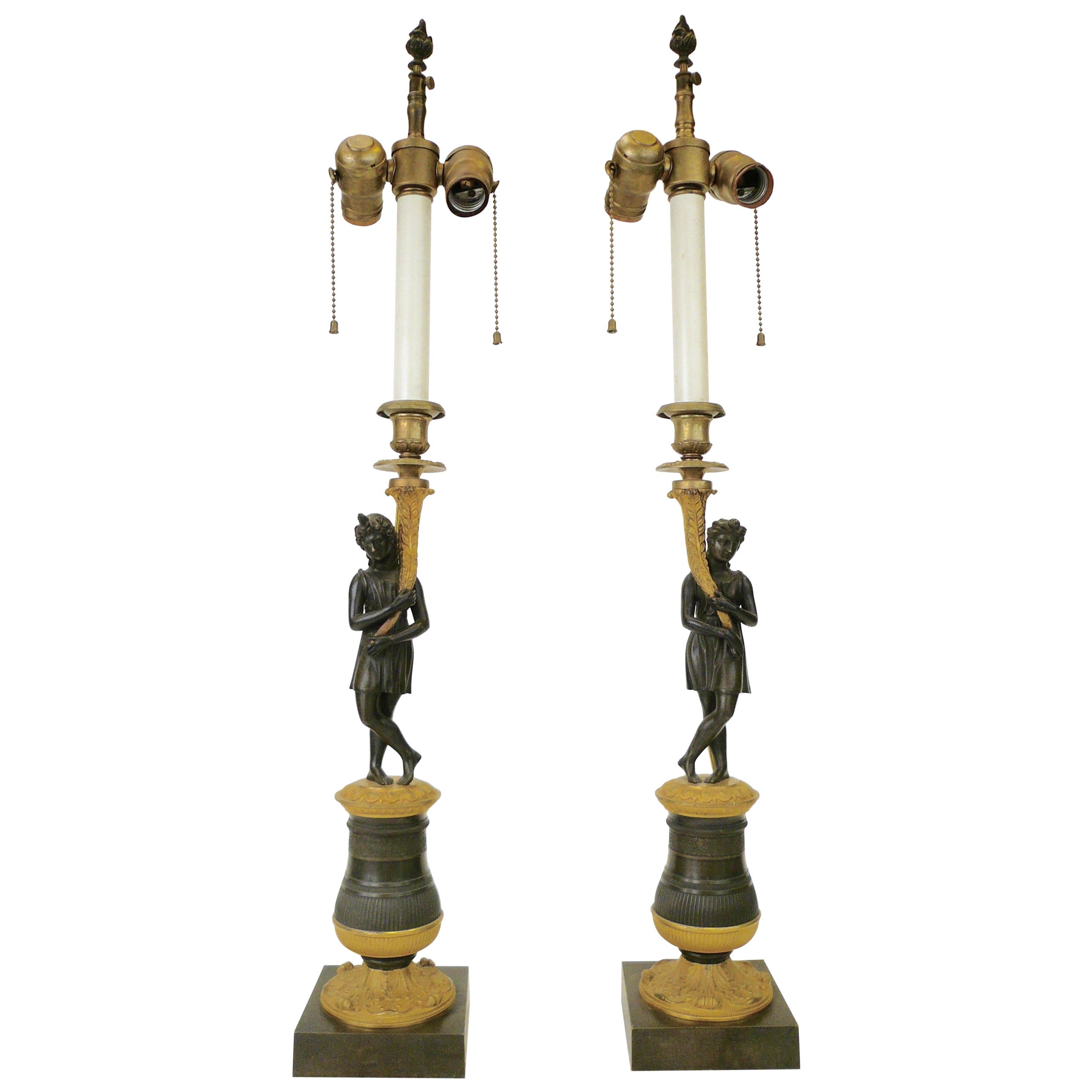 Pair of Charles X Gilt and Patinated Bronze Figural Candlestick Lamps