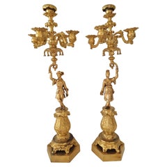 Antique Pair Charles X ormolu candelabra held by oriental figures