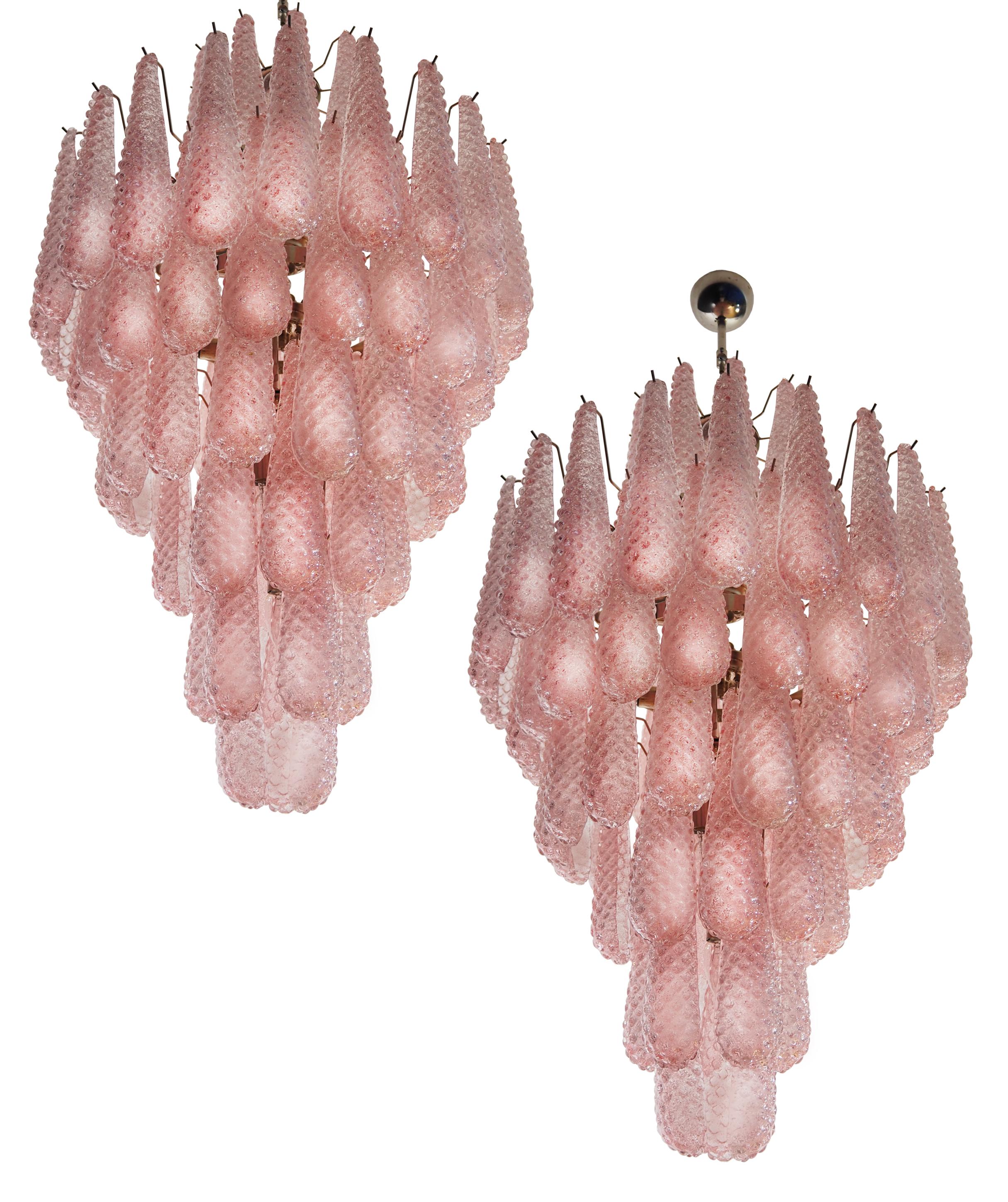 Pair Gorgeous Italian vintage chandeliers made from 85 great hourglass Murano glass. 7 levels. Nickel plated metal frame.
Period: late XX century
Dimensions: 48,50 inches (125 cm) height without chain; 29,50 inches (75 cm) diameter – I can add any