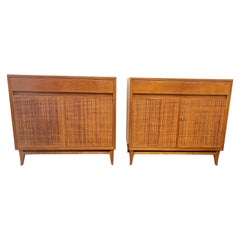 Pair cherrywood and rattan cabinets with bar