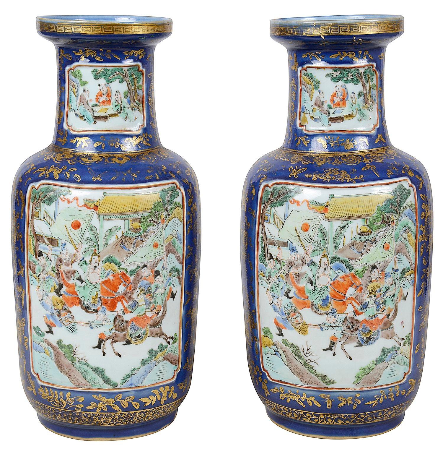 Pair Chinese 19th Century Powder Blue vases / lamps. Each with Blue and gilded ground, inset hand painted panels depicting classical battle scenes of warriors on horse back.

We can convert the vases to lamps if required.
Batch 80 DNYZ G240/23