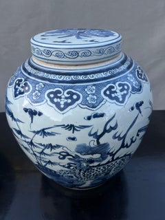Pair Chinese Blue and White Lidded Porcelain Chinese Dragon Vases