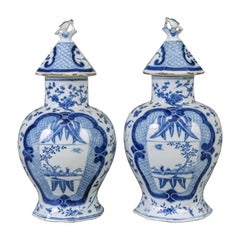 Pair of Chinese Blue and White Vases with Conical Lids