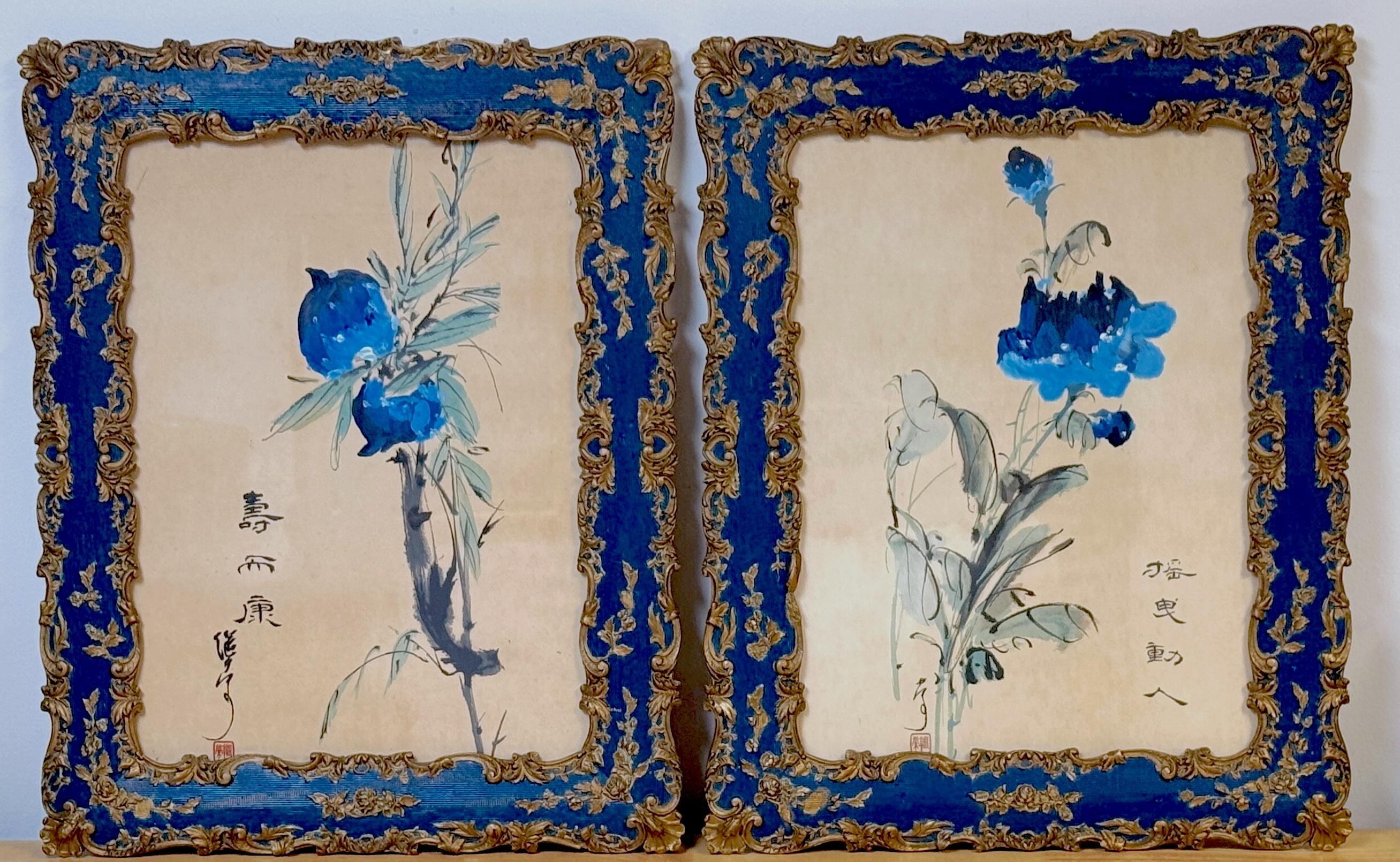 Pareja de pinturas chinas en tinta azul y aguada Peonías y granadas, escuela Lingnan, papel envejecido hecho a mano, presentadas en marcos policromados en azul occidental y dorados ornamentados en azul 19 pulgadas de ancho x 24 pulgadas de alto 

El