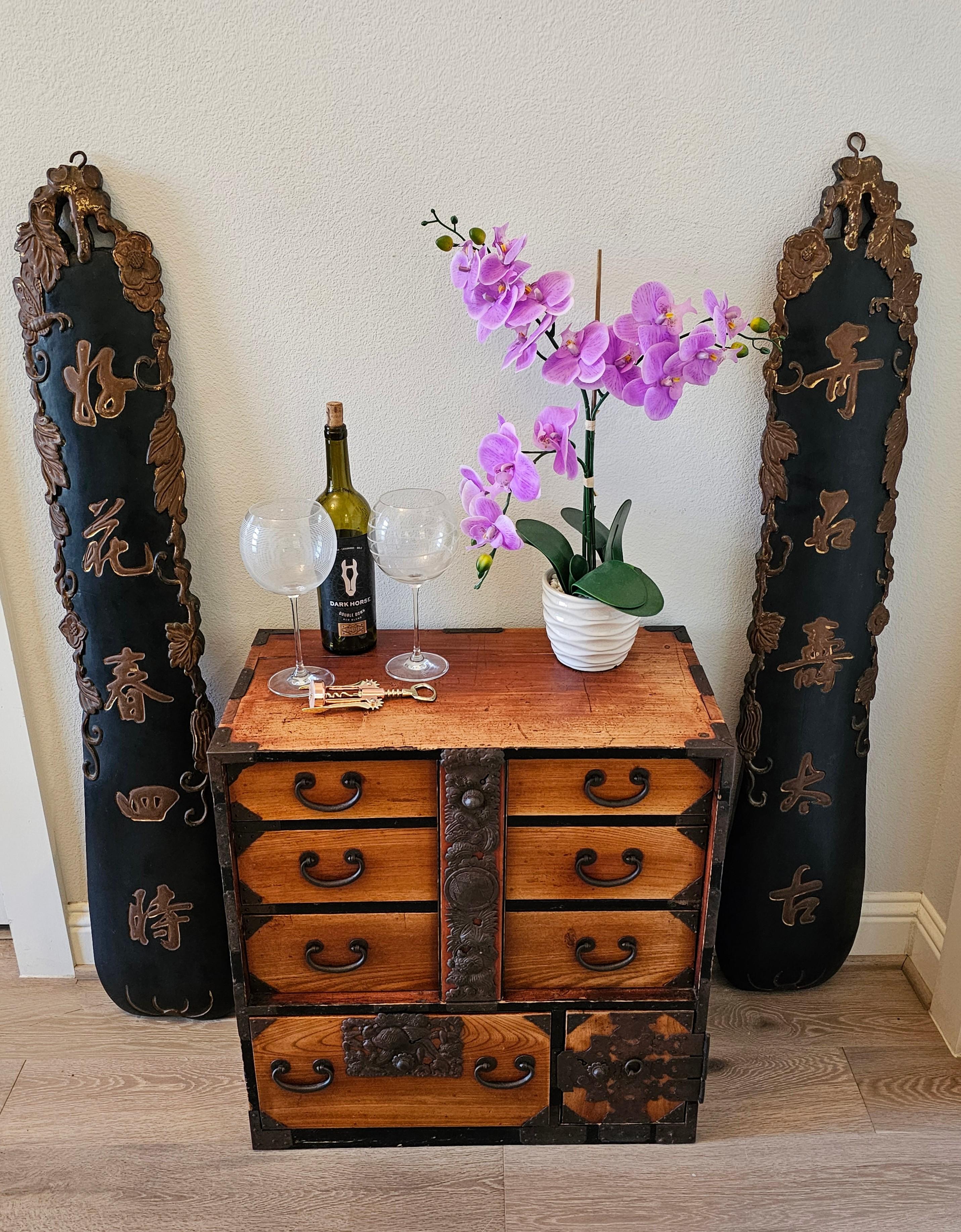 A striking pair of large vintage Chinese architectural paint decorated wooden vertical sign carvings with interesting provenance. 

Dating to the first half of the 20th century, China, solid wood panels with elongated tall narrow sculptural form and