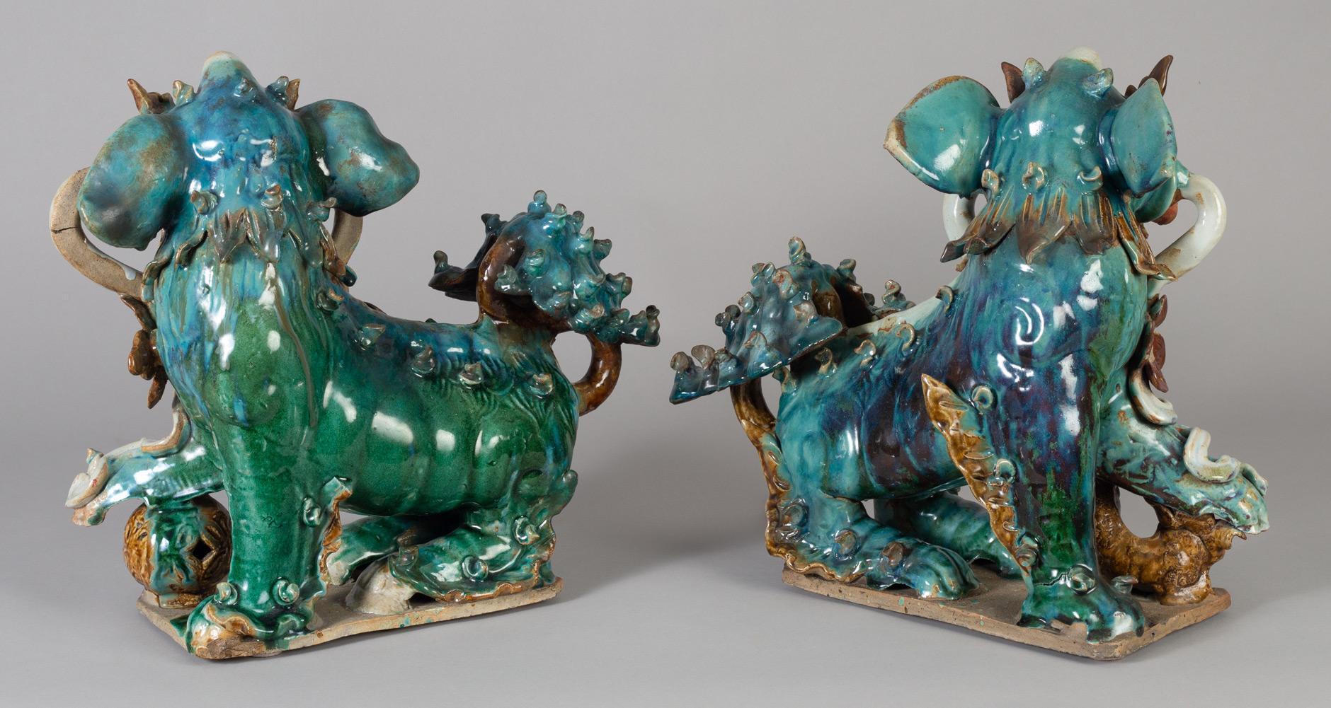 Late 19th Century Pair of Chinese Ceramic Buddhistic Lions For Sale