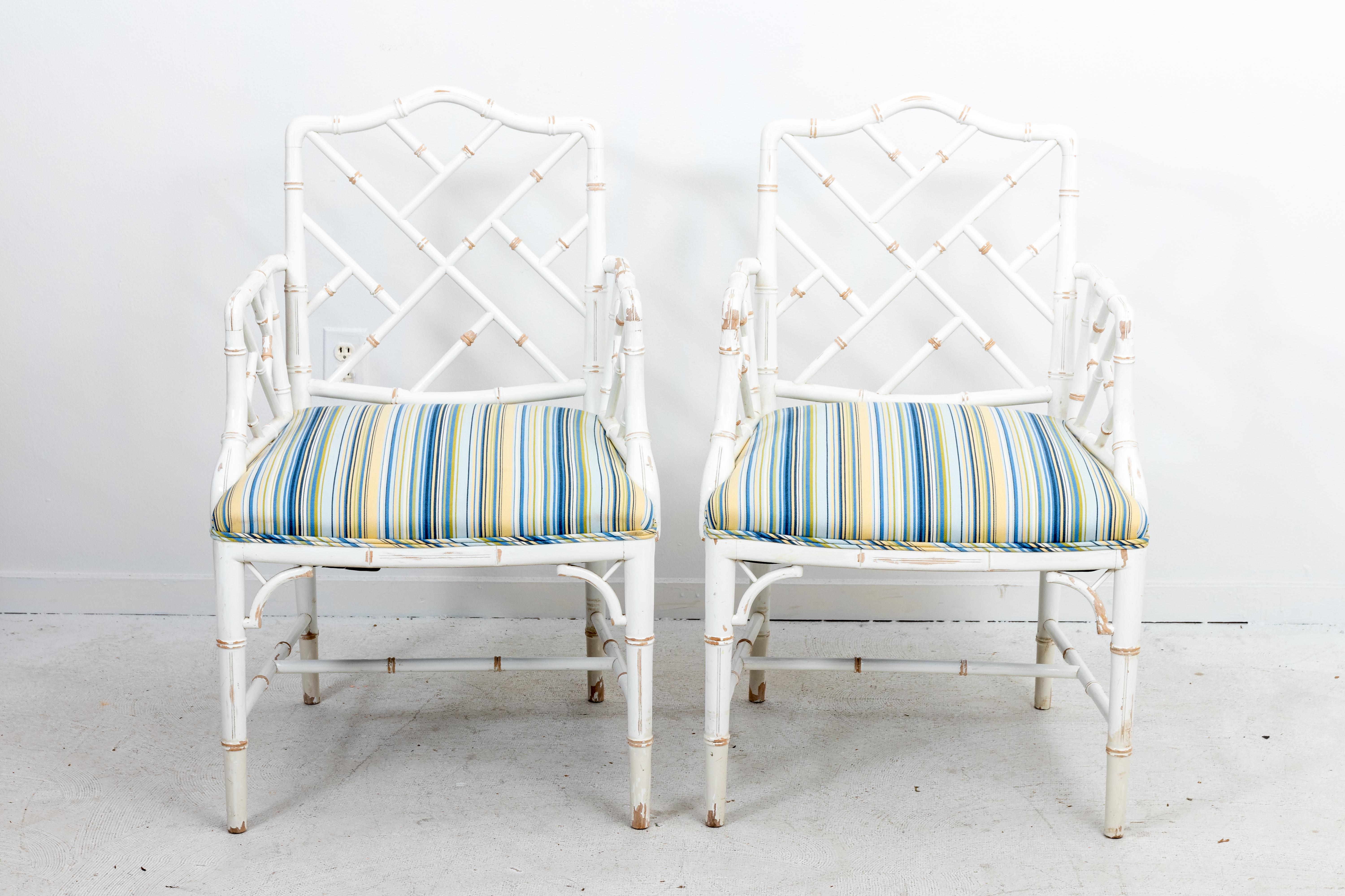 Pair of Painted Chinese Chippendale style distressed finish faux bamboo armchairs. Made by Century Furniture in North Carolina. Clean upholstery. Priced per pair.