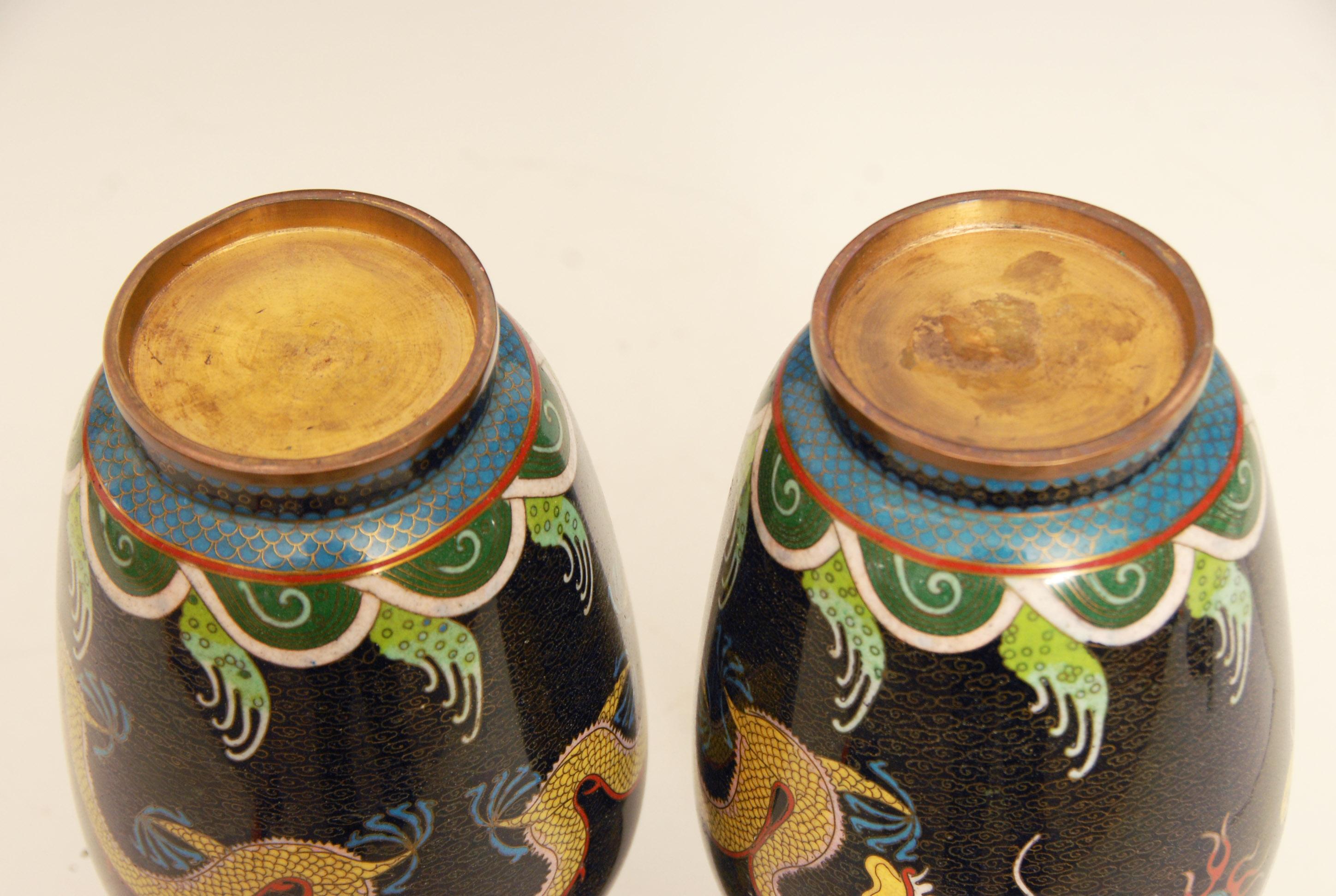 Super pair of Chinese cloisonné dragon vases, early 20th century.

Price includes free shipping to anywhere in the world.