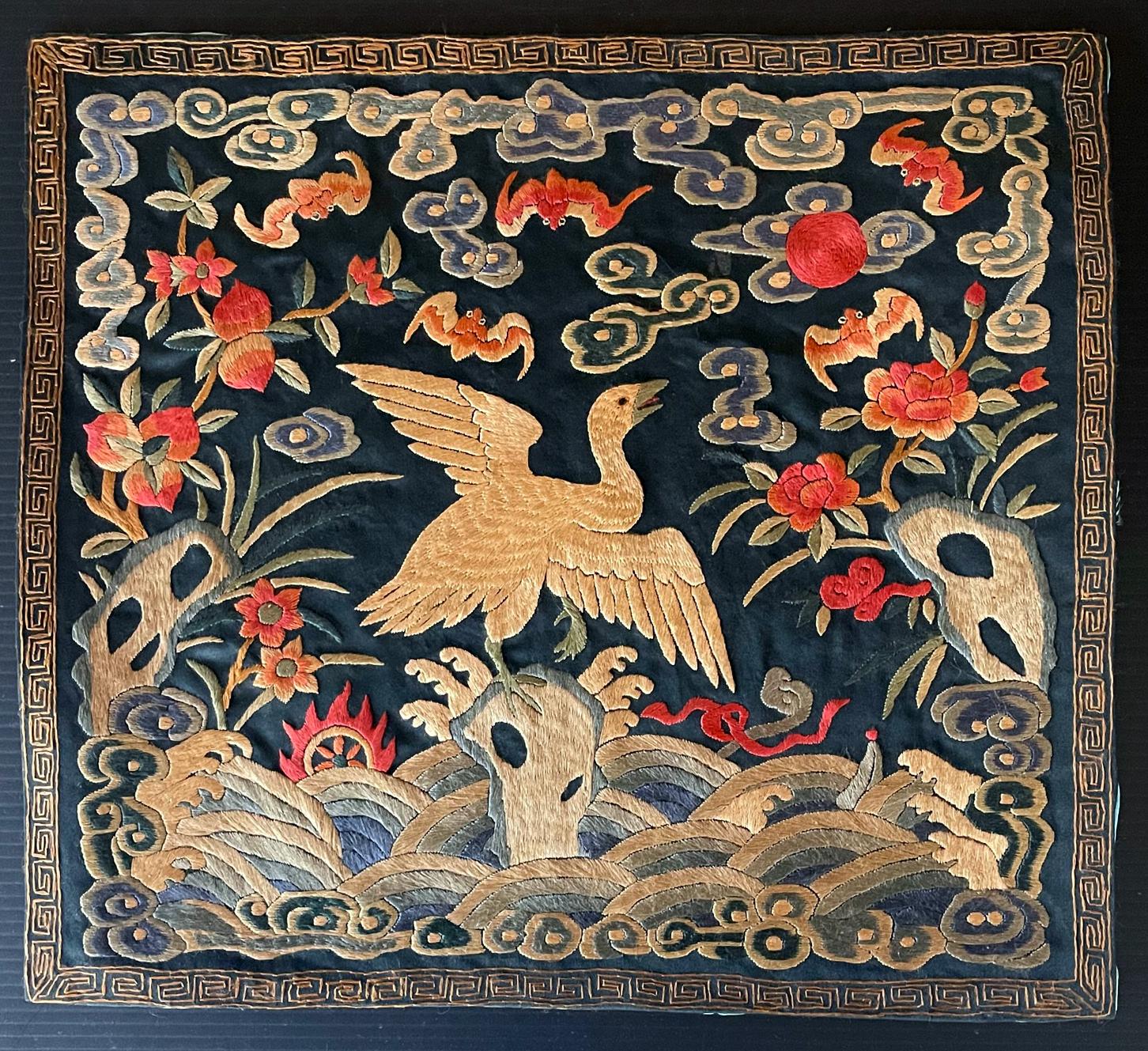 A fine matching pair of embroidered silk civil rank badge panels (known in Chinese as Buzi) unframed. The panels feature borders of fret archaic key and are centered by the insignia bird goose, the symbol of the fourth rank civil official in the