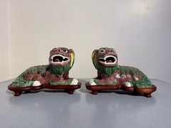 Pair Chinese Export Famille Verte Biscuit Porcelain Foo Lions, mid 20th Century