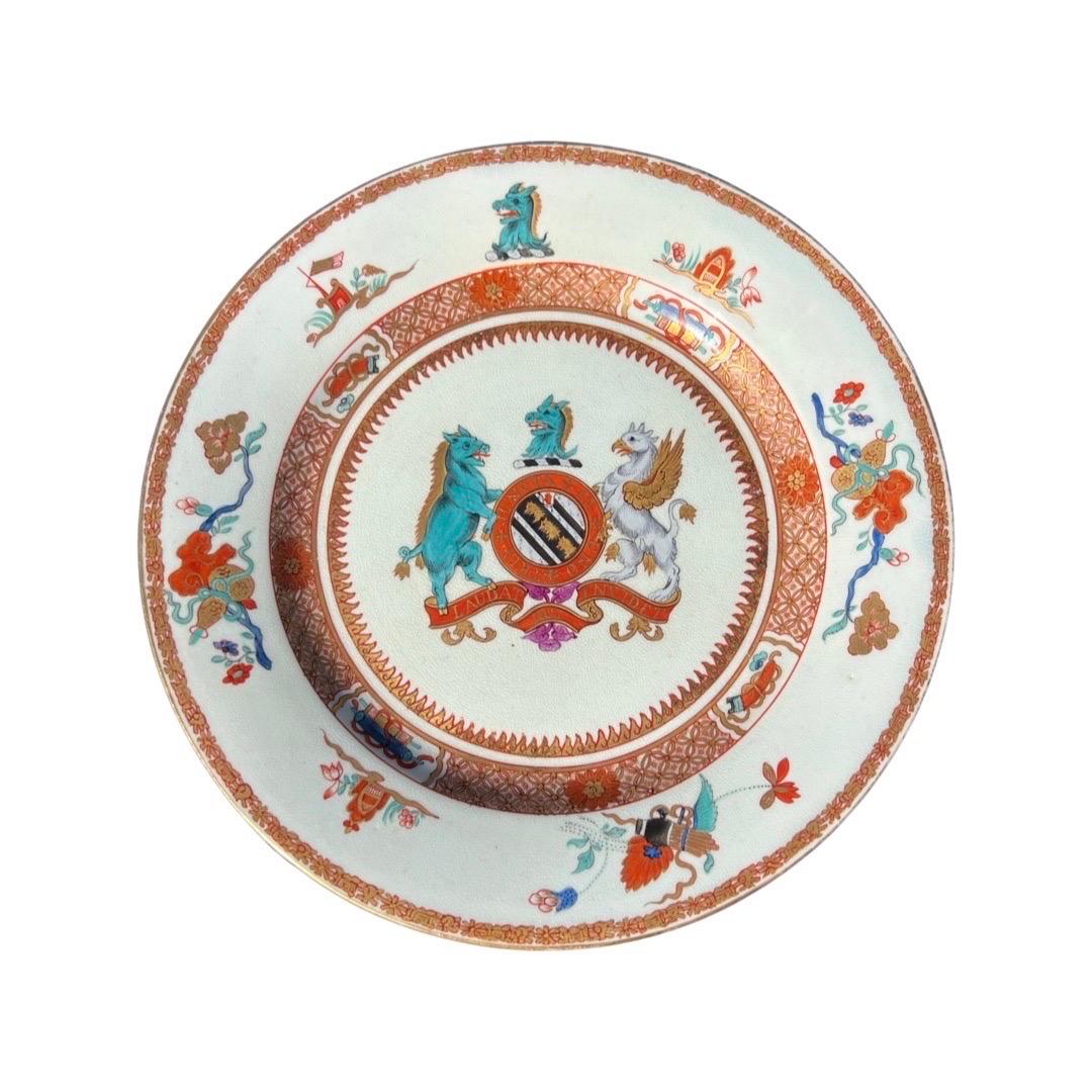 Pair, Chinese Export ‘Yonge’ Armorial Porcelain Soup Plates Yongzhen or Yongzheng Circa 1731.

“Pair of Export Porcelain Armorial Soup Plates, China, c. 1731, centering the arms of Yonge, enclosed by the motto of the order of the Bath, flanked by a