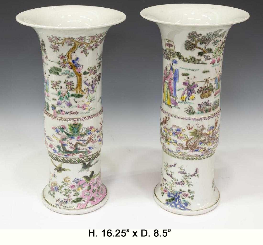 Beautiful pair of Chinese Famille rose porcelain beaker vases. Early 20th century and possibly earlier.
The flared rim is over an enamel decorated cylindrical body depicting scenes of children playing with dragons in the clouds.
Underglazed six