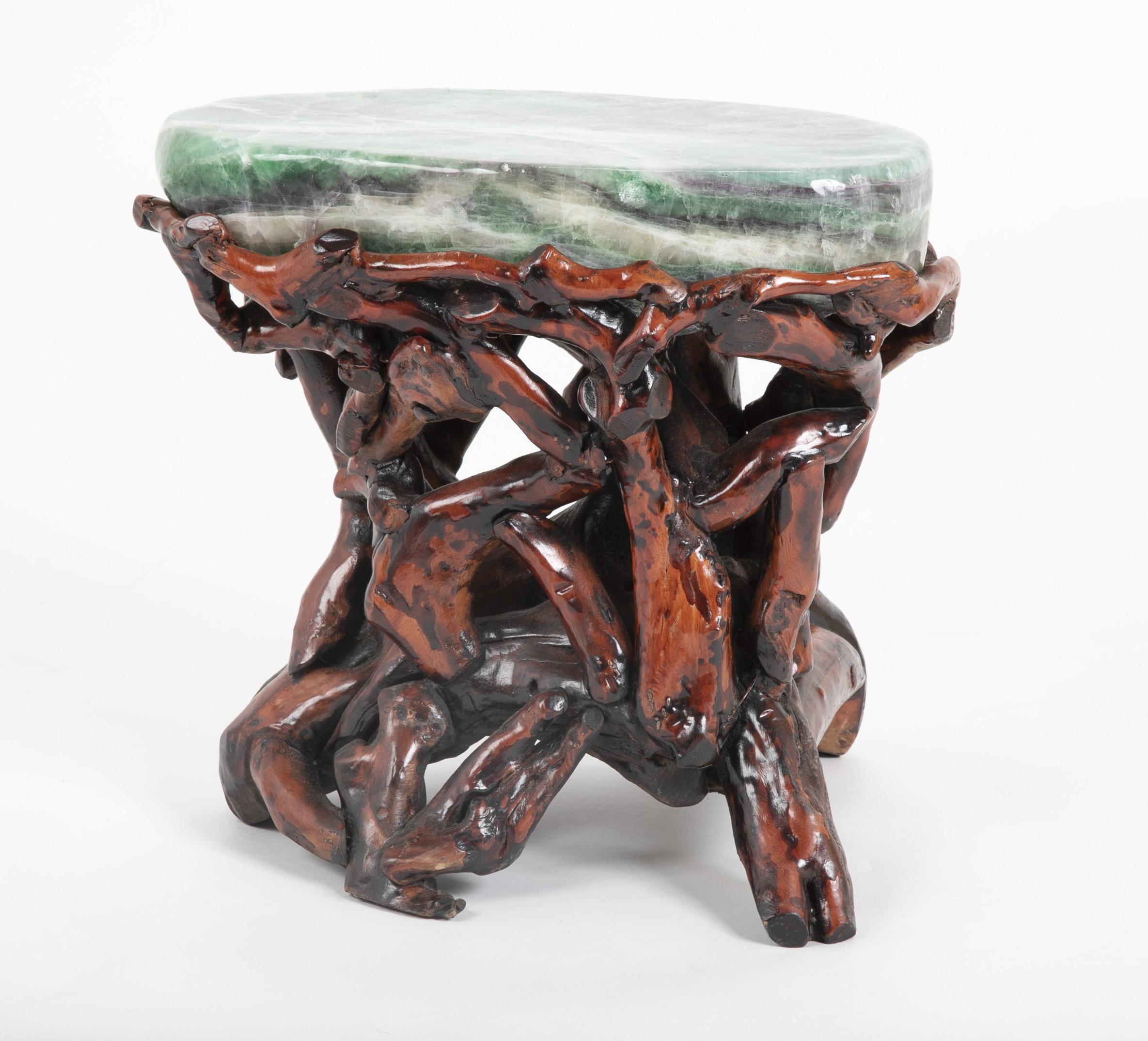 Pair of Chinese fluorite root stools. Mid-20th century.

Fluorite is a highly protective & stabilizing stone, useful for grounding & harmonizing spiritual energy.

May be sold individually at $3,200 each

Dimensions:
14