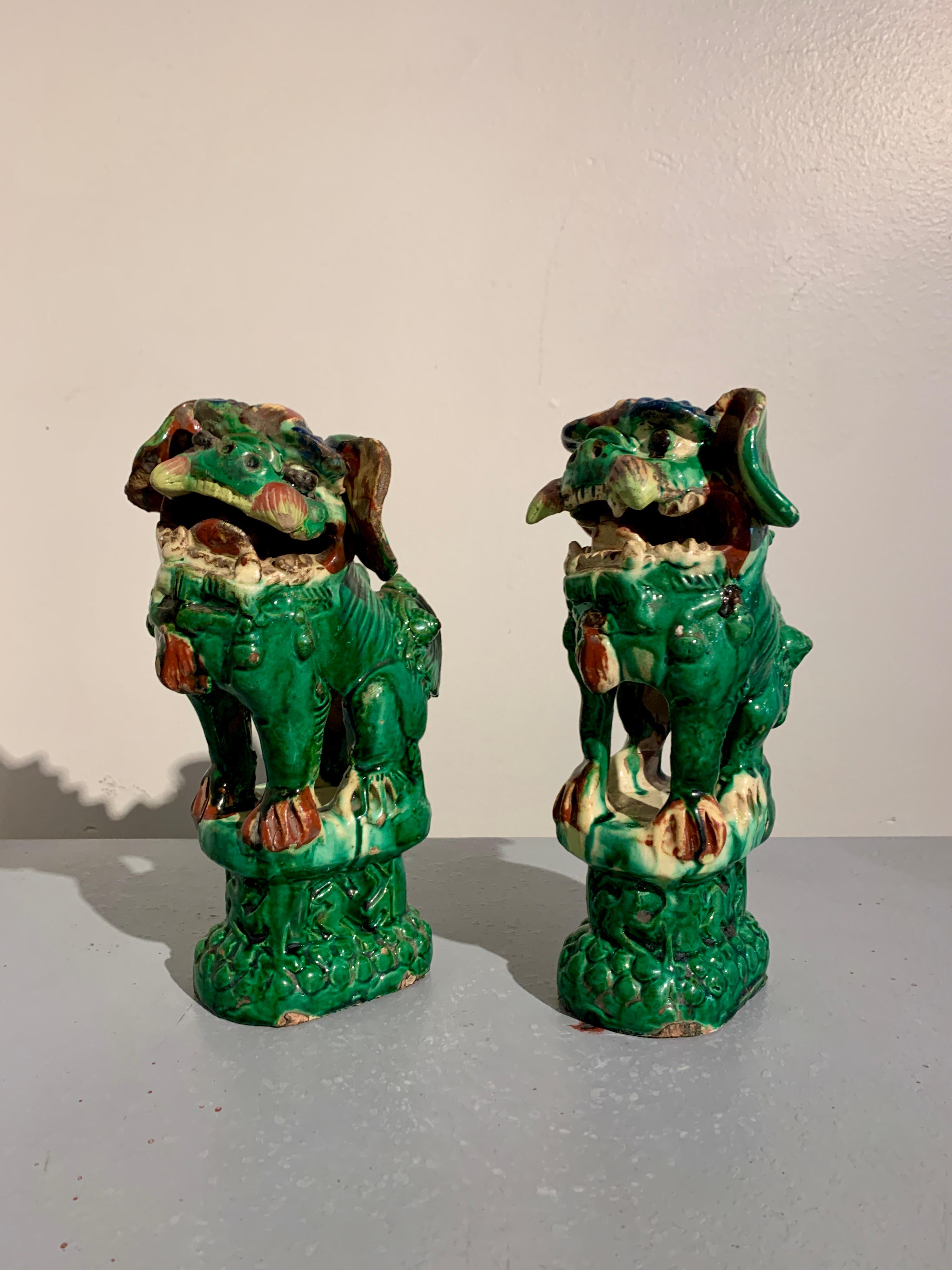 Pair Chinese Green Glazed Foo Dogs, Qing Dynasty, circa 1900, China In Fair Condition In Austin, TX