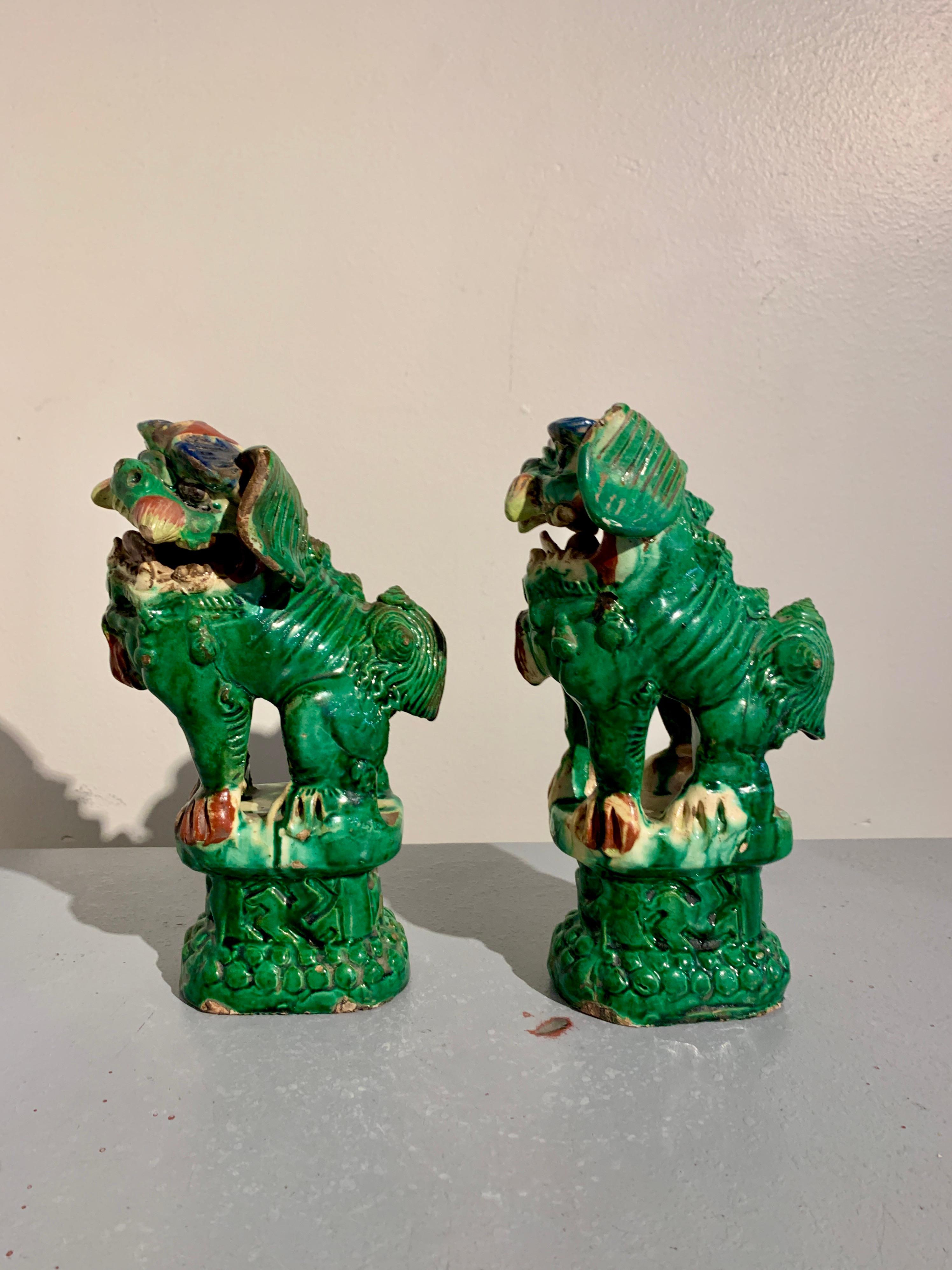 Early 20th Century Pair Chinese Green Glazed Foo Dogs, Qing Dynasty, circa 1900, China