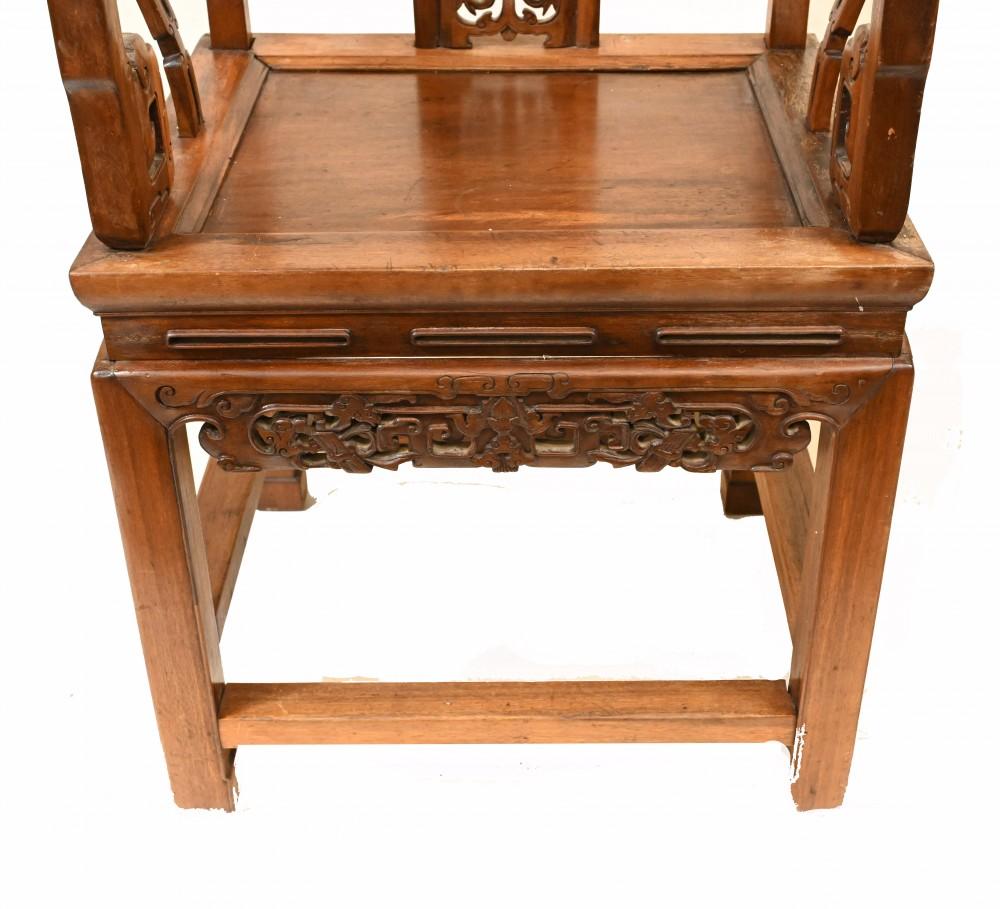 Pair carved antique Chinese hardwood arm chairs
We date these to circa 1920 
Features intricately carved backsplat
Great interiors pair as an accent chair for an Asian inspired interior.


 