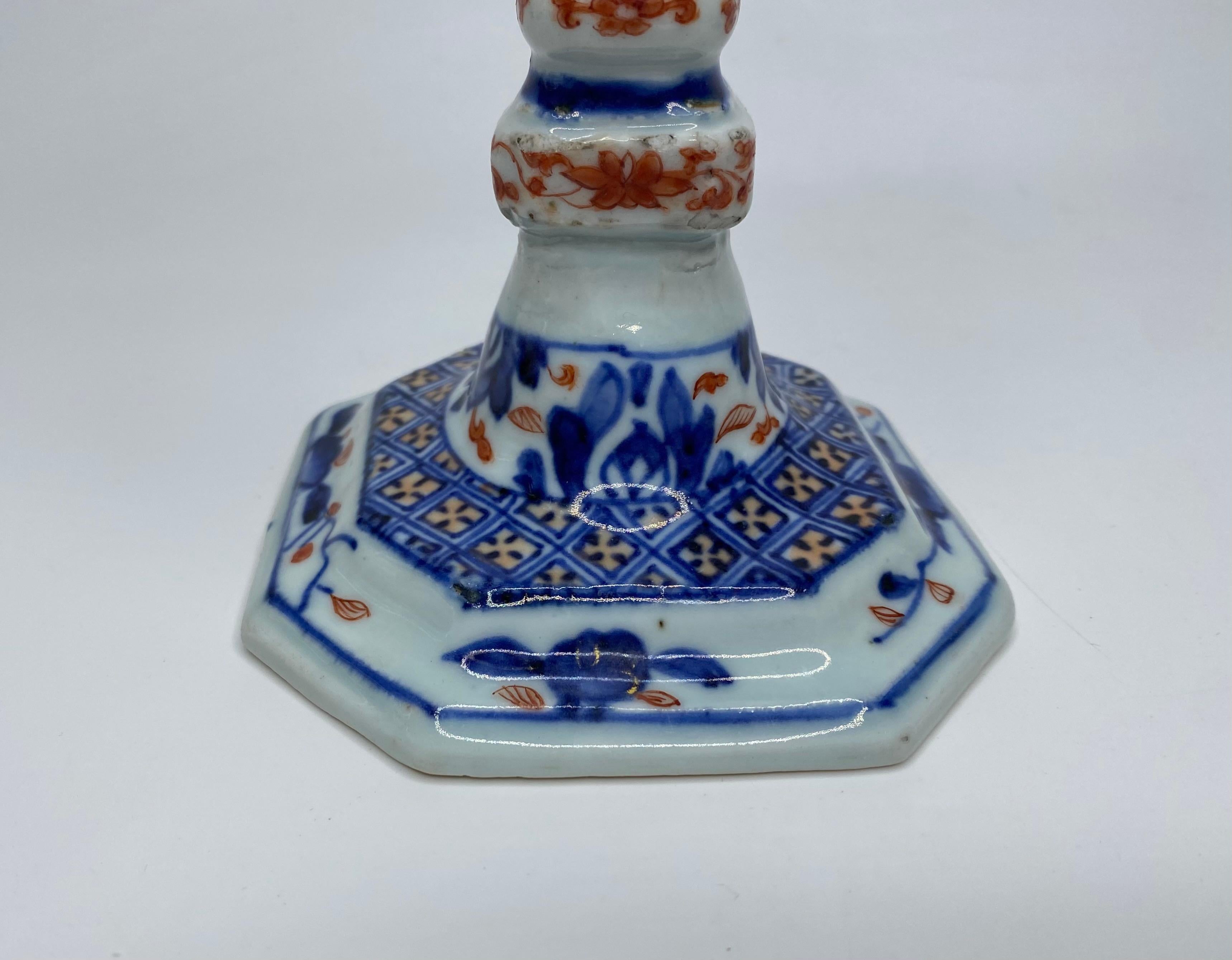 Fired Pair Chinese Imari porcelain candlesticks, c. 1720. Kangxi Period. For Sale