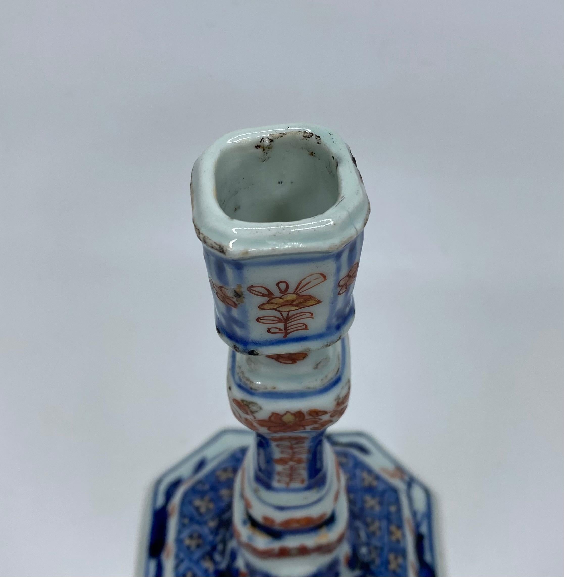 Porcelain Pair Chinese Imari porcelain candlesticks, c. 1720. Kangxi Period. For Sale