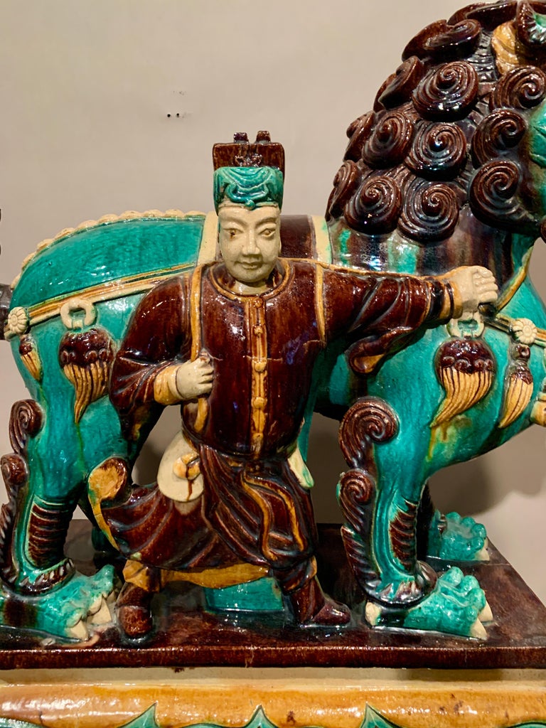 Pair Chinese Ming Dynasty Glazed Buddhist Lions and Attendants, 17th