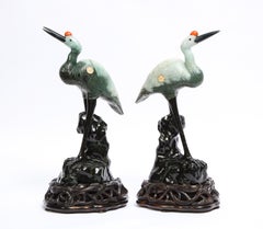 Pair Chinese Mottled Light Green Jadeite Carvings, Cranes on Carved Wood Stands