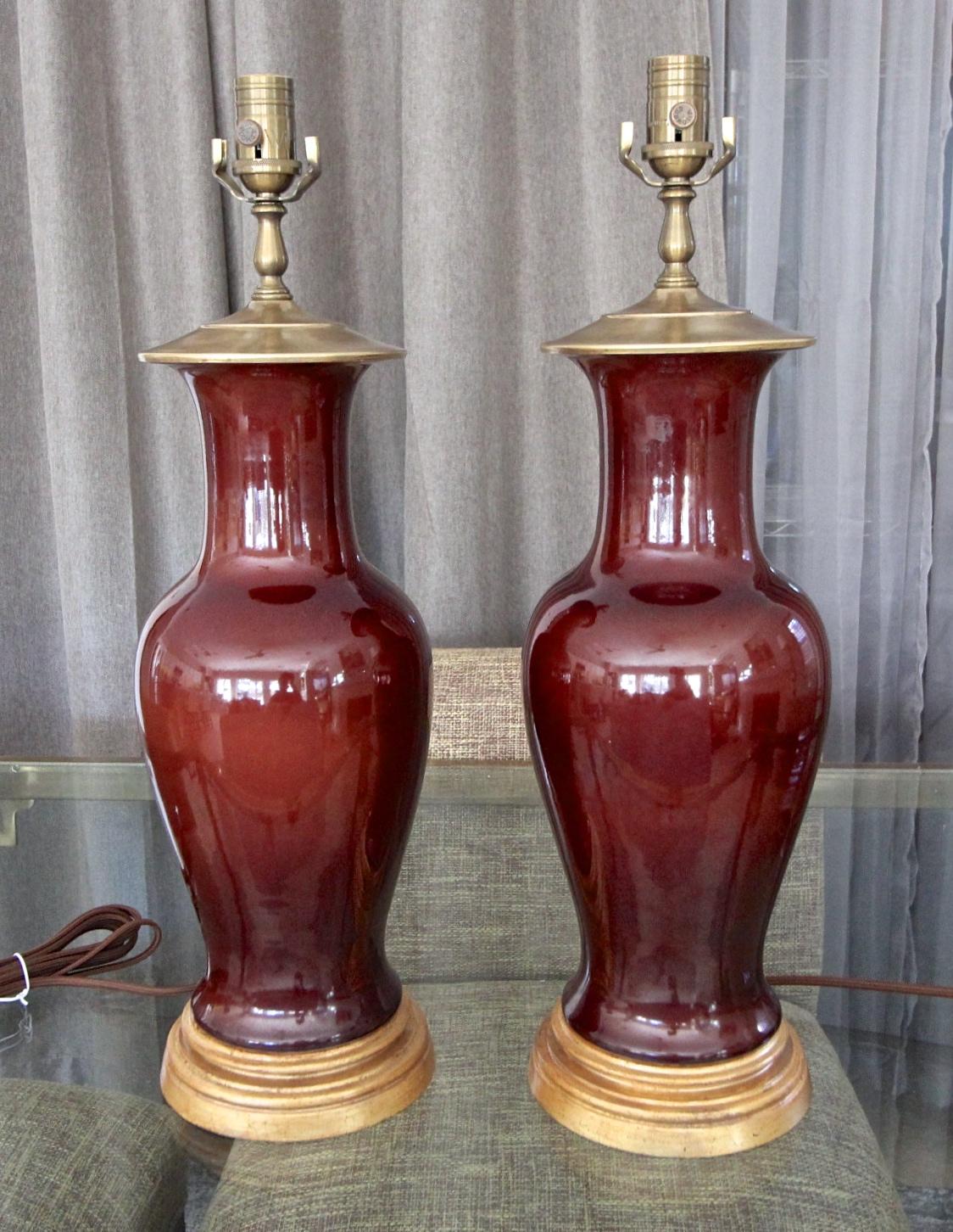 Late 20th Century Pair Chinese Oxblood  Baluster Porcelain Table Lamps