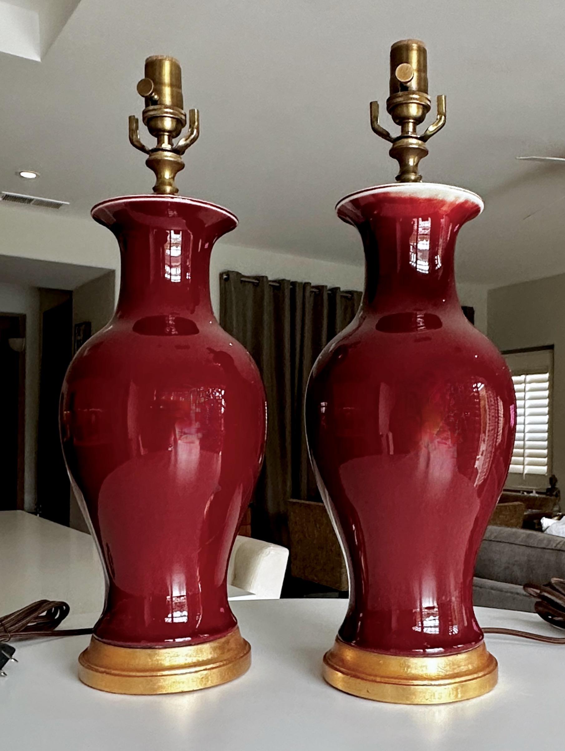 Mid-20th Century Pair Chinese Oxblood Baluster Porcelain Table Lamps For Sale