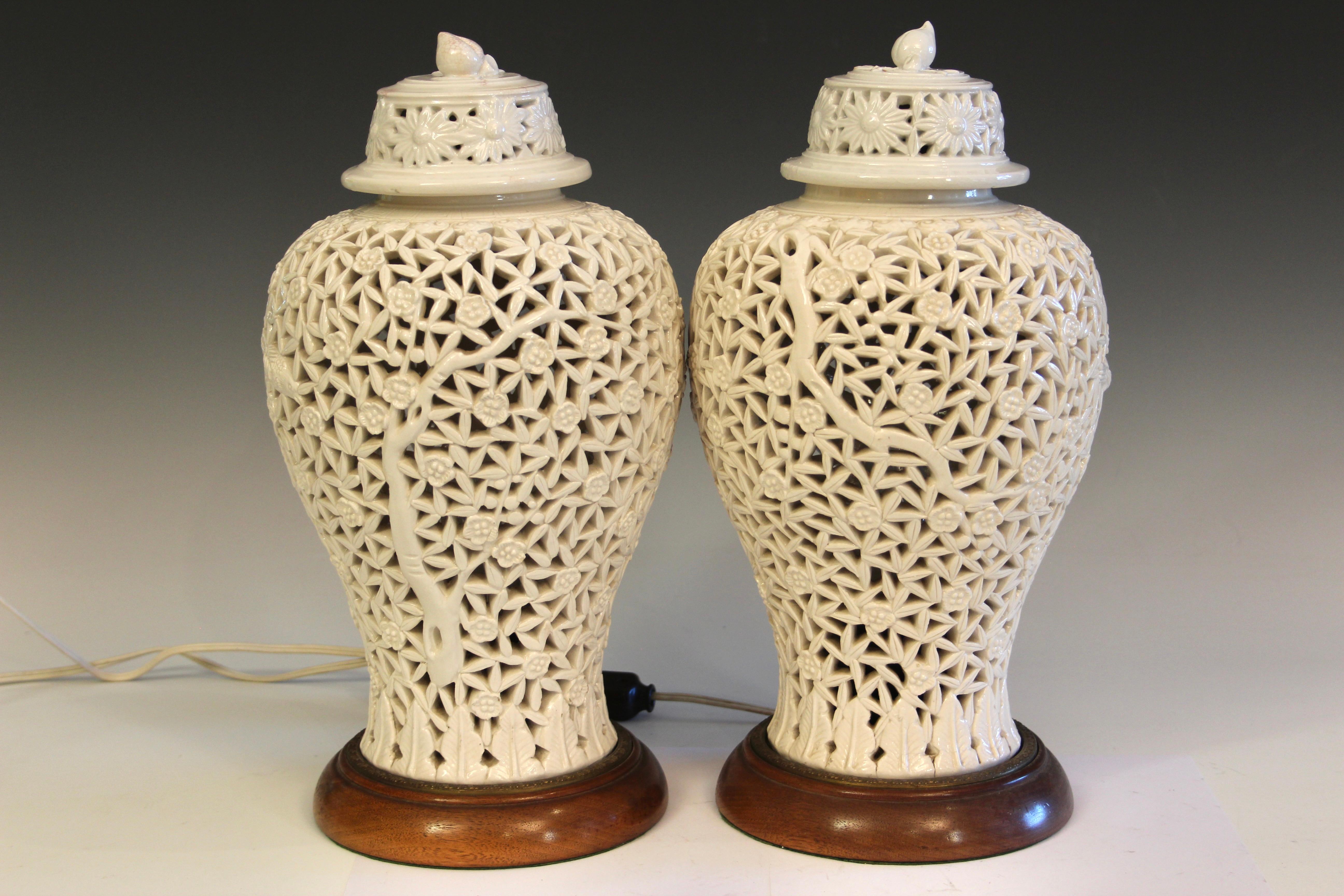 Pair Chinese porcelain carved Blanc de Chine vases, electrified as lamps, circa early 20th century. 15