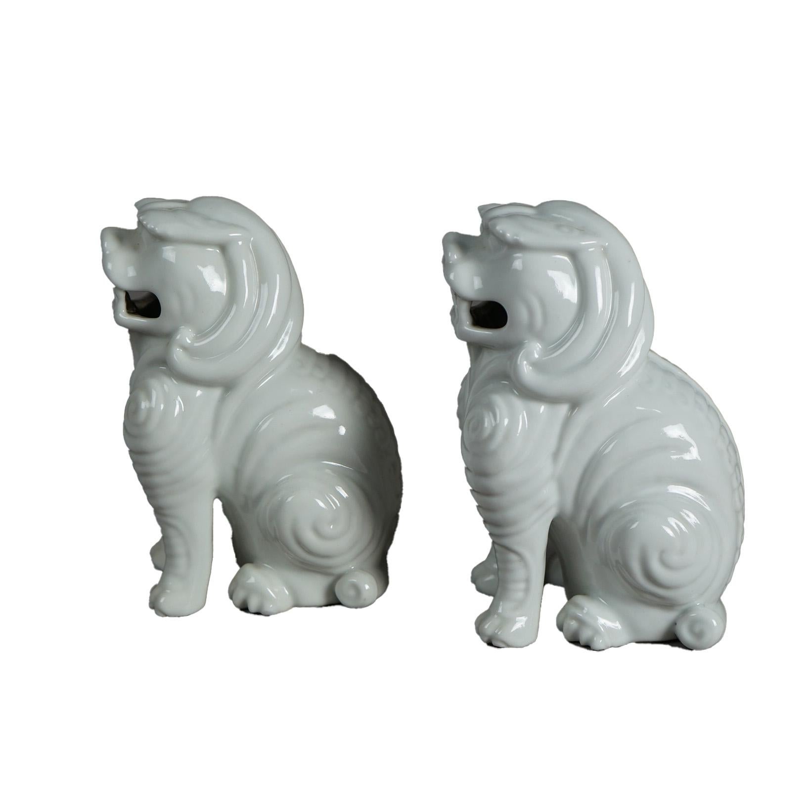 Asian Pair Chinese Porcelain Blanc De Chine Foo Dogs 20th C For Sale