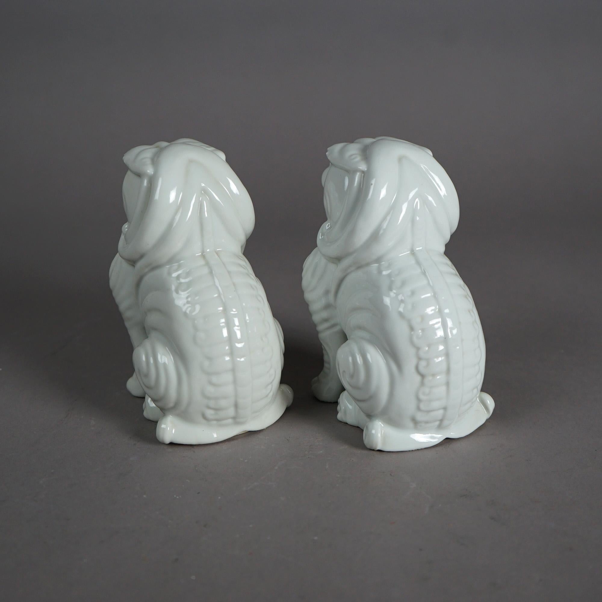 Pair Chinese Porcelain Blanc De Chine Foo Dogs 20th C In Good Condition For Sale In Big Flats, NY