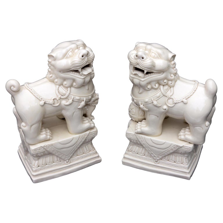 Pair Chinese Porcelain Dehua Blanc de Chine Foo Dogs For Sale at 1stDibs