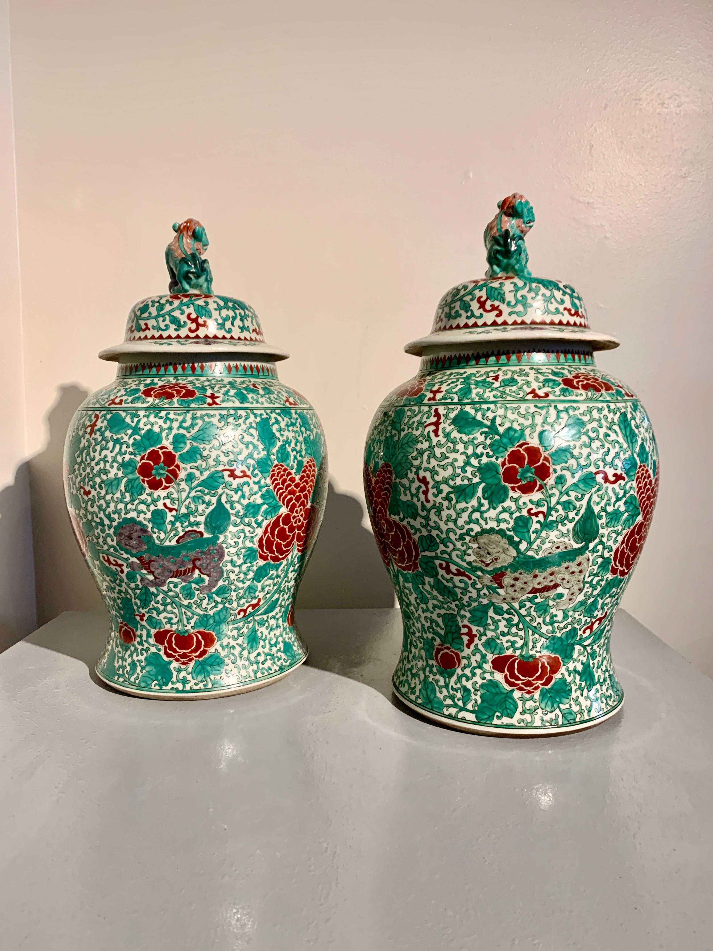 Enameled Pair Chinese Porcelain Foo Dog Covered Jars, mid 20th Century, China For Sale