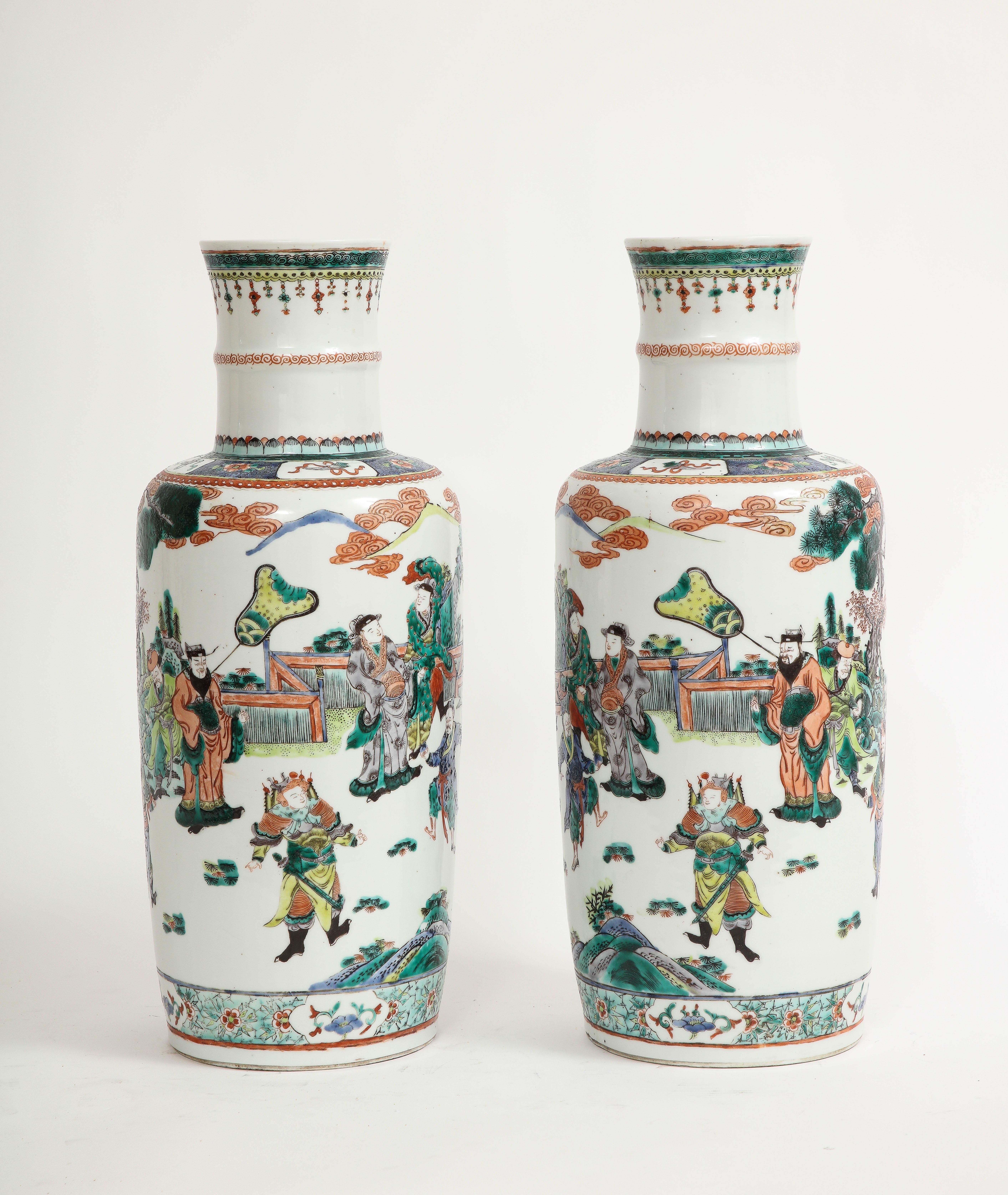 A Pair of Chinese Porcelain Rouleau Form Famille Vert  Imperial Subject Vases, 1800s

Step into the realm of Chinese porcelain mastery with this captivating pair of Chinese Porcelain Rouleau Form Famille Vert Imperial Subject Vases. These remarkable