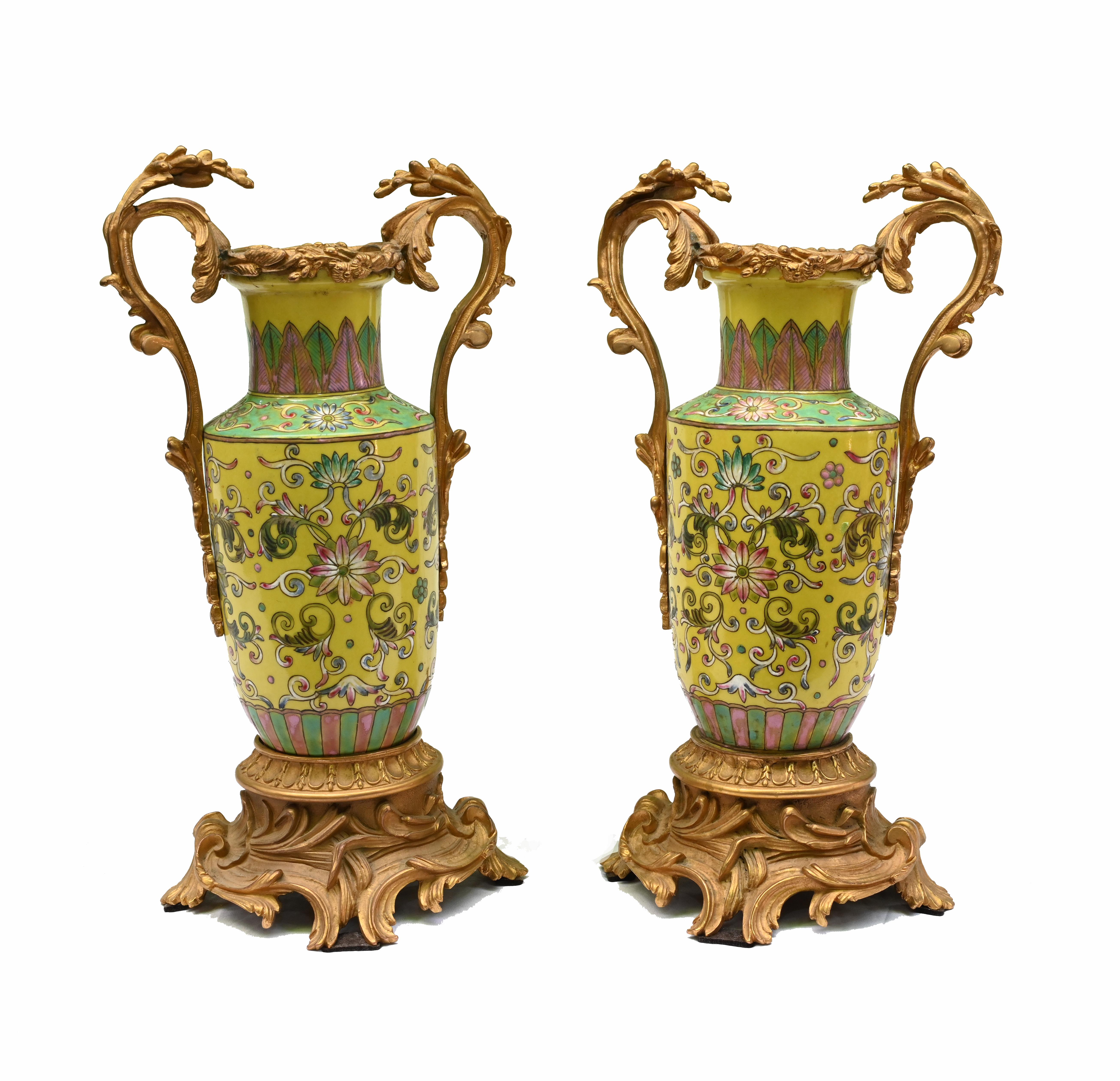 Elegant pair of antique Chinese Famille Jaune porcelain vases on gilt mounts
Circa 1920 on this pretty pair decorated with floral motifs
We bought these from a private residence in London's Mayfair
Offered in great shape ready for home use right