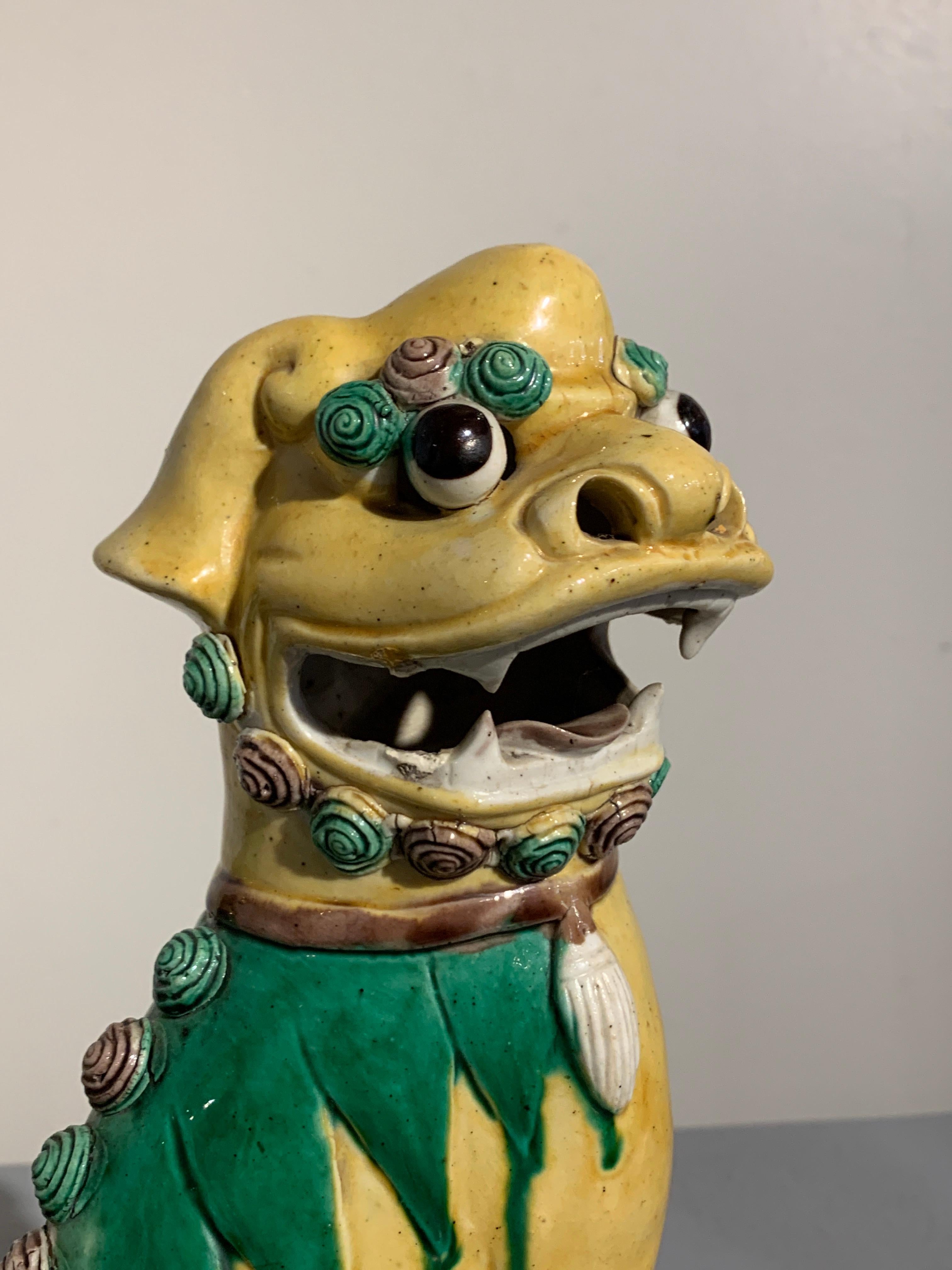 Pair of Chinese Yellow Glazed Porcelain Foo Dogs, circa 1930s 3