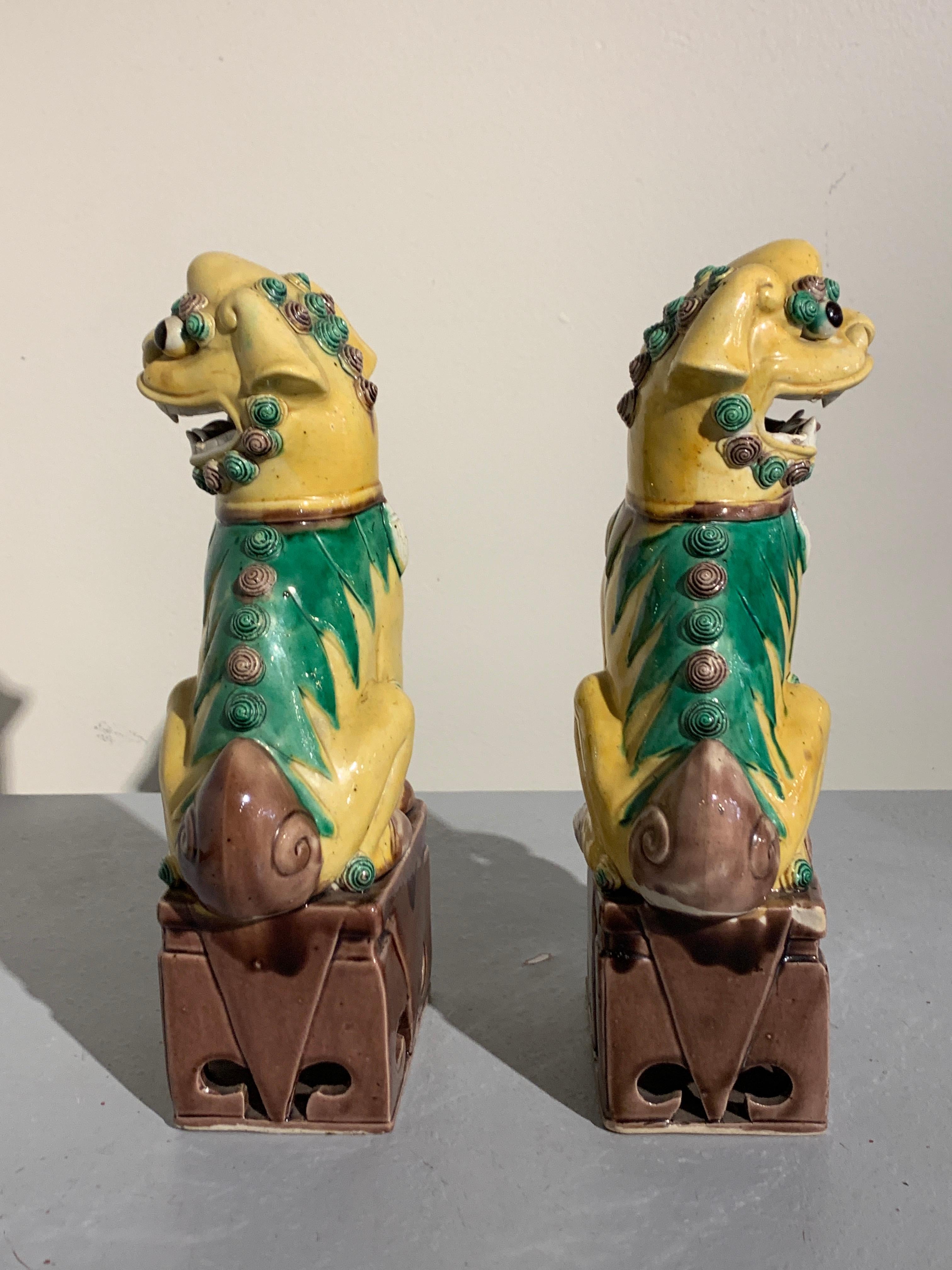 Pair of Chinese Yellow Glazed Porcelain Foo Dogs, circa 1930s In Good Condition In Austin, TX