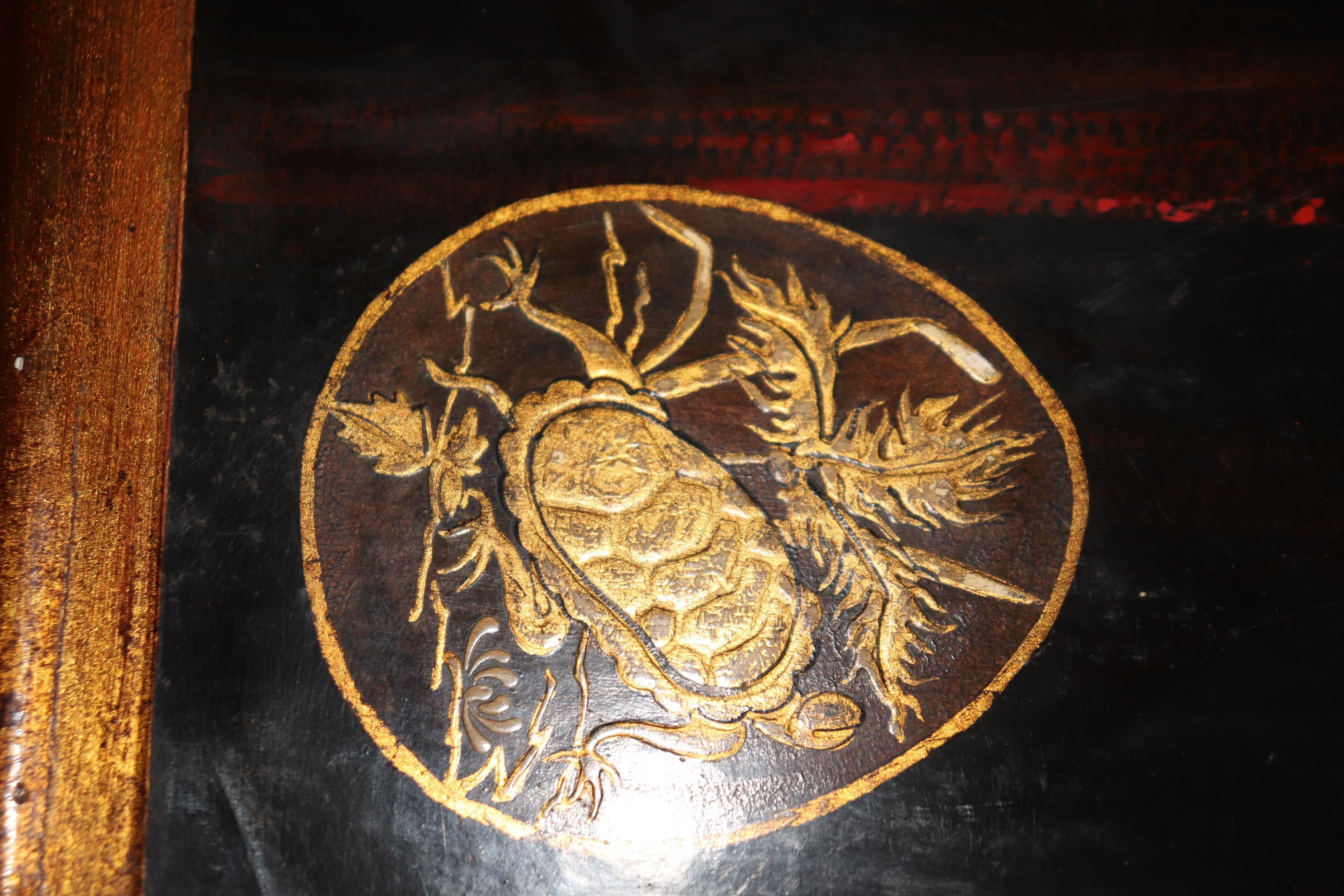 This is a fine quality pair of chinoiserie paint decorated end tables of graceful form with an abstract depiction of mythical animals such as magical turles, foo dogs and cranes. The chinoiserie is the finest quality raised relief and in exceptional