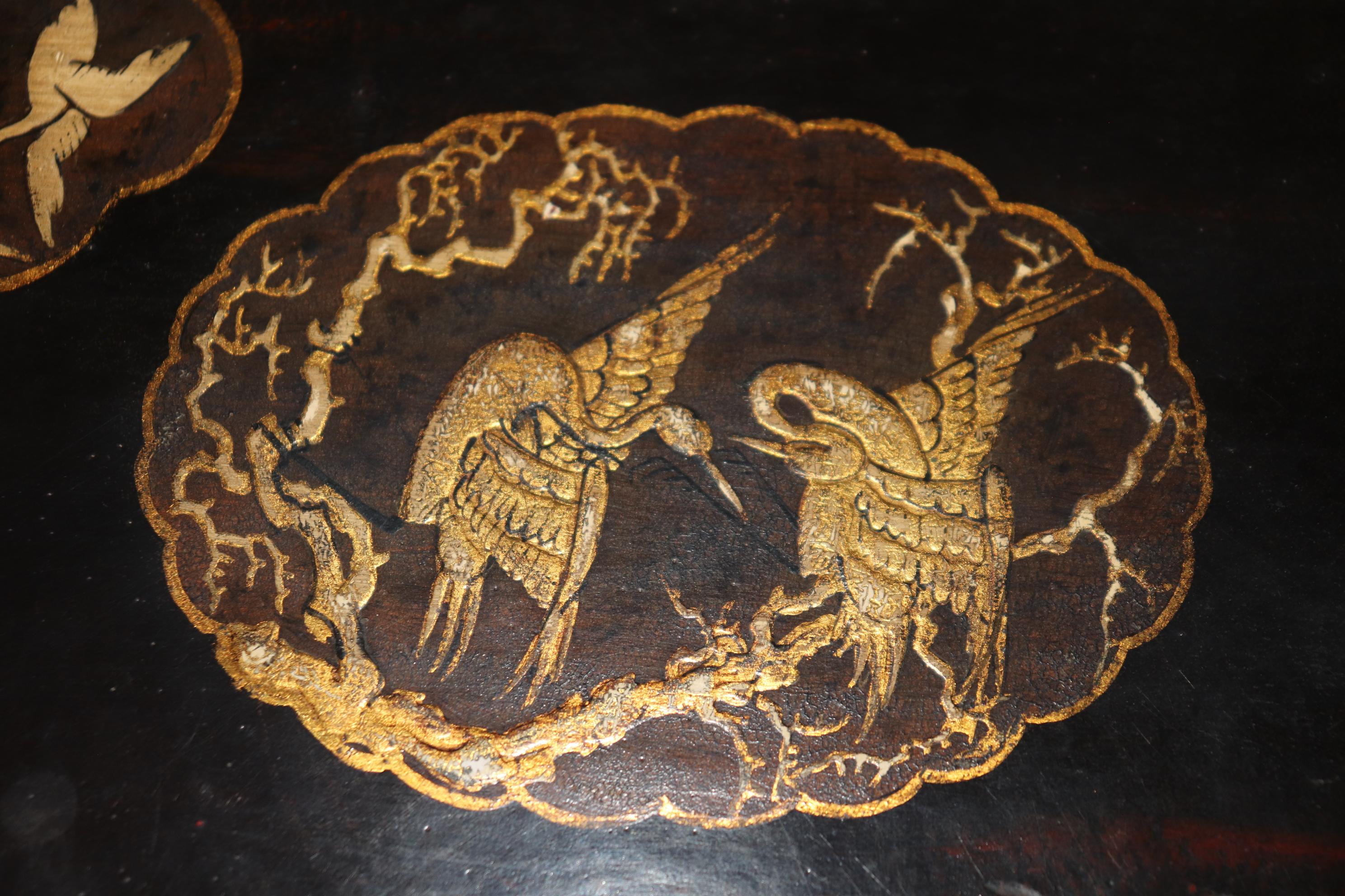 Chinese Pair Chinoiserie Black and Gold Lacquered End Tables Painted Mythical Animals