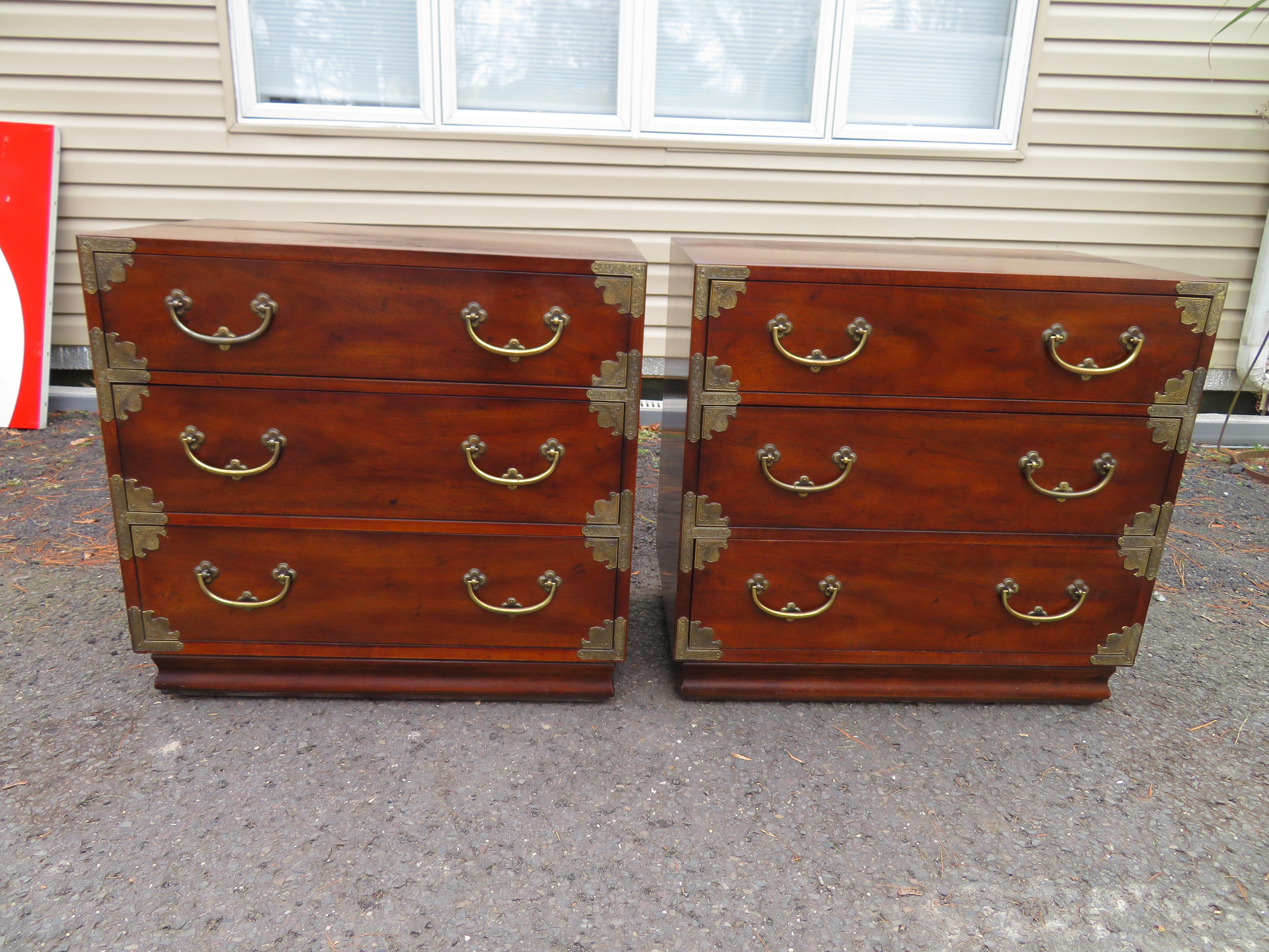 Wonderful pair of Chinoiserie Henredon campaign Tansu chests/nightstands. We love these with the ornate brass details and the slightly distressed finish. We also love the size measuring 28.5