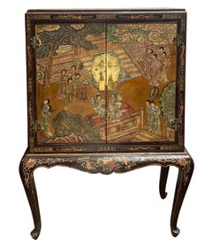 Pair Chinoiserie lacquer cabinets on stand. circa 1900