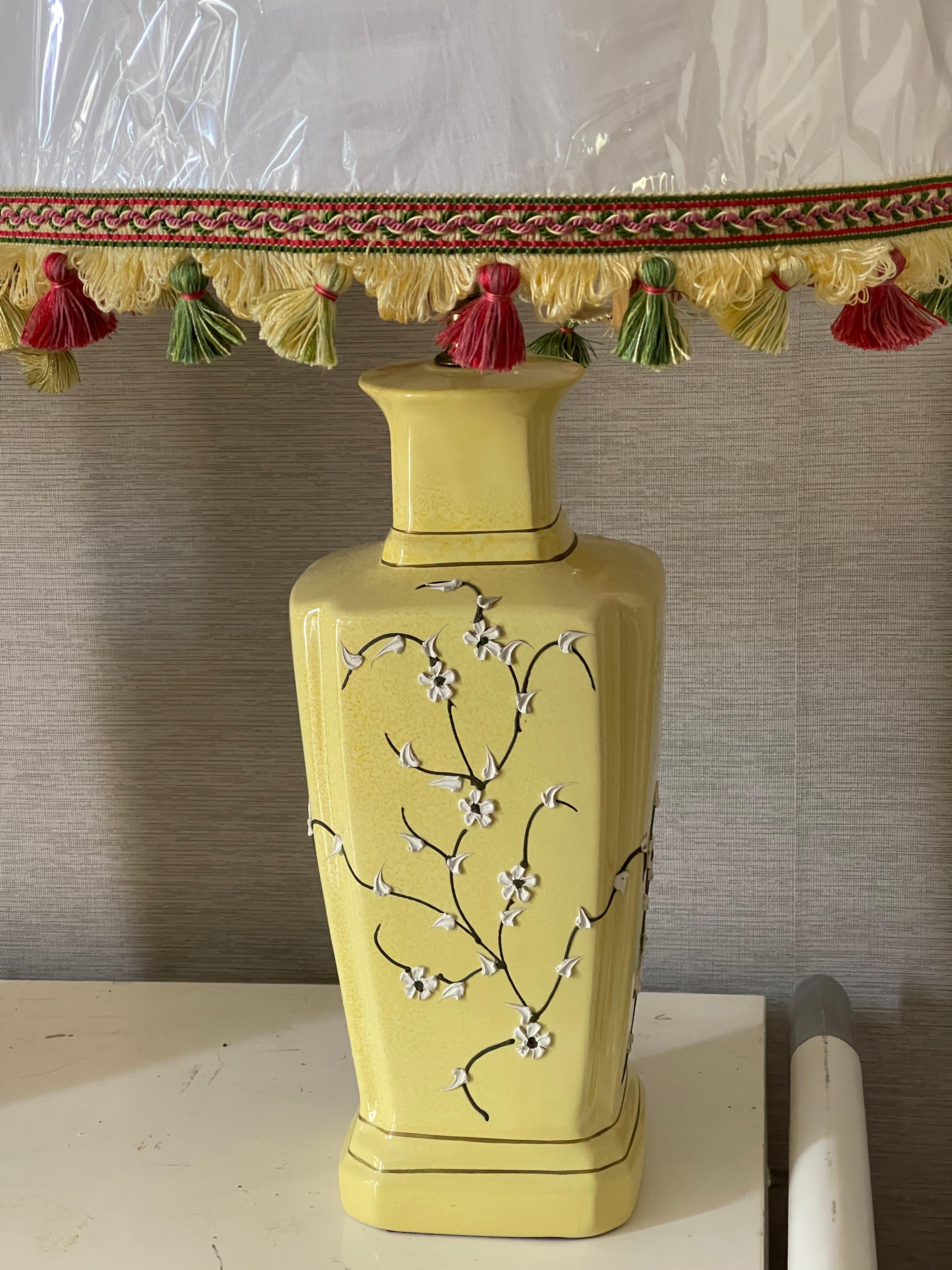 Late 20th Century Pair Chinoiserie Yellow ceramic Lamps with Ftinged Shades For Sale
