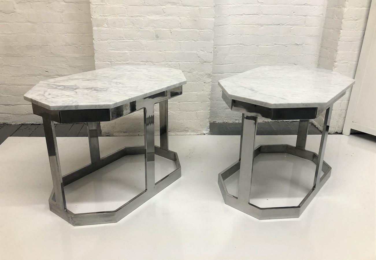 Pair of chrome and Carrara marble top tables. The chrome tables and marble tops have octagonal shapes.
 