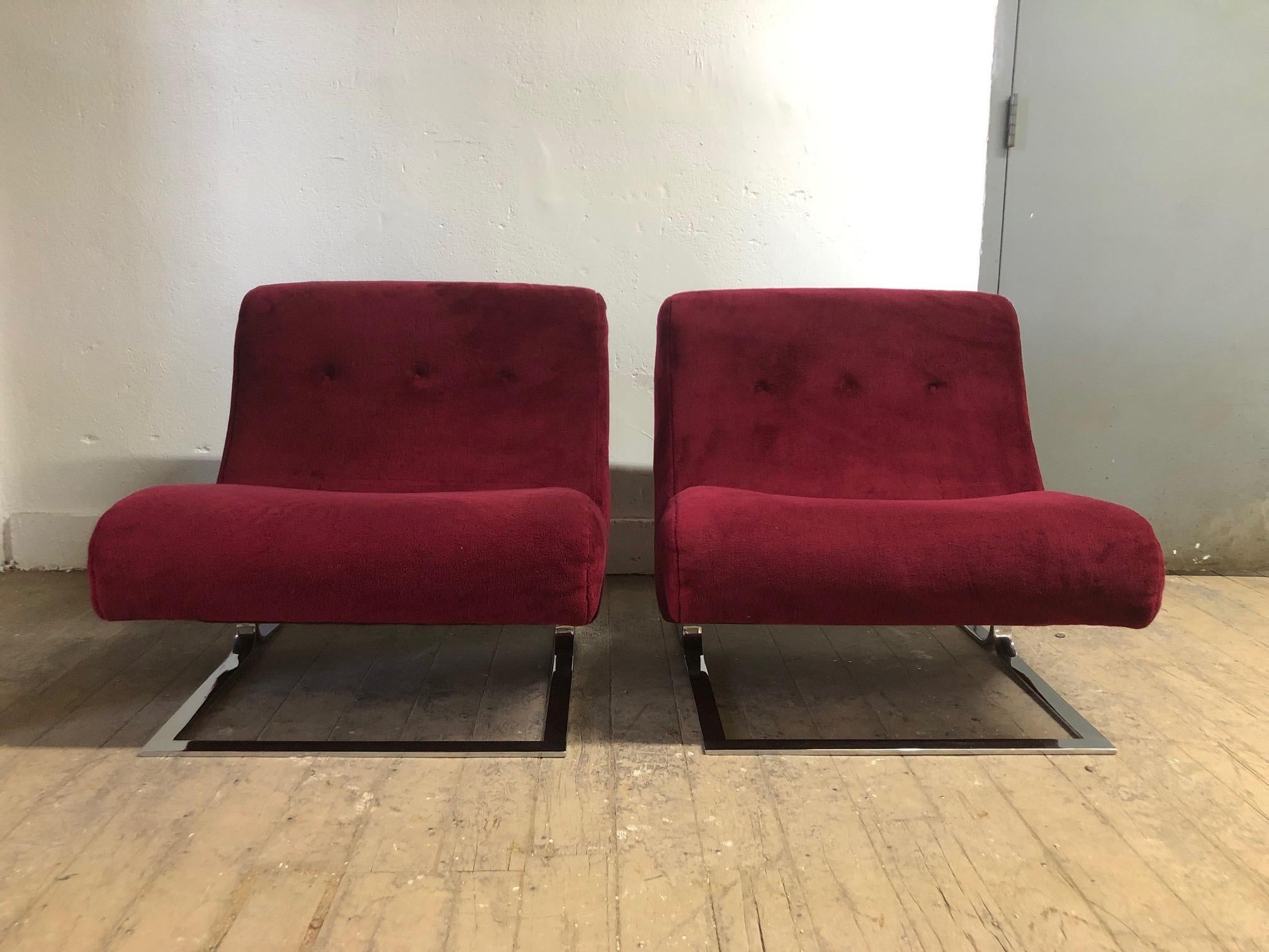 Pair of chrome lounge chairs style of Milo Baughman.
