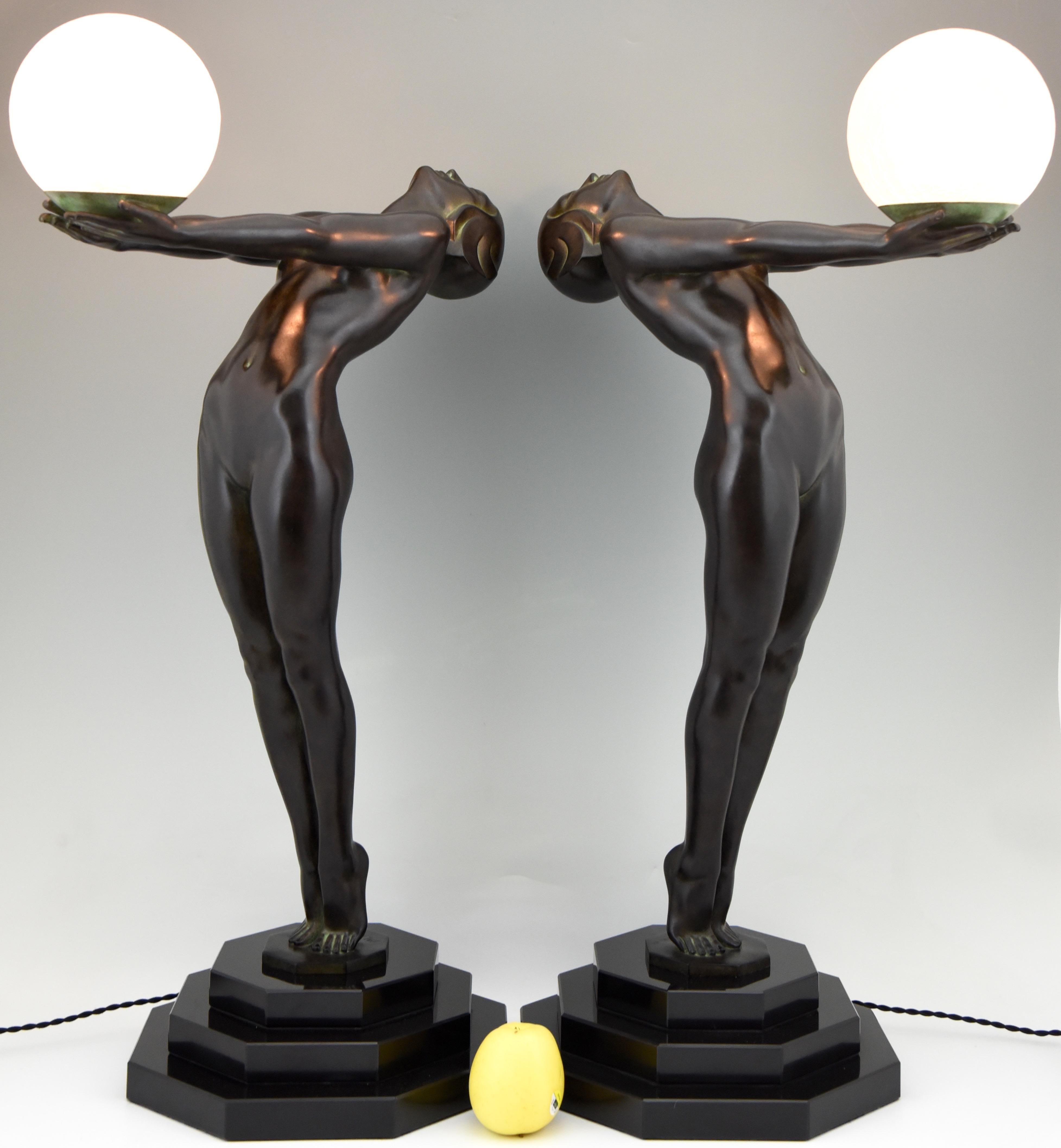 Patinated Pair of Clarté Art Deco Style Lamps Max Le Verrier Nude with Globe 84 cm 33 inch
