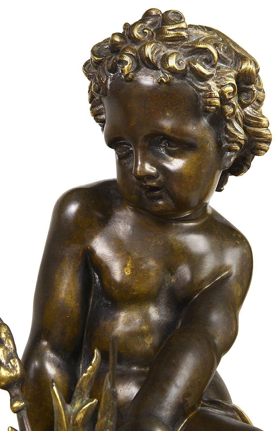 Patinated Pair Classical 19th Bronze Putti Seated on a Rock For Sale