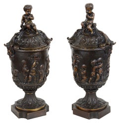Pair of Classical 19th Century Bacchus Lidded Bronze Urns
